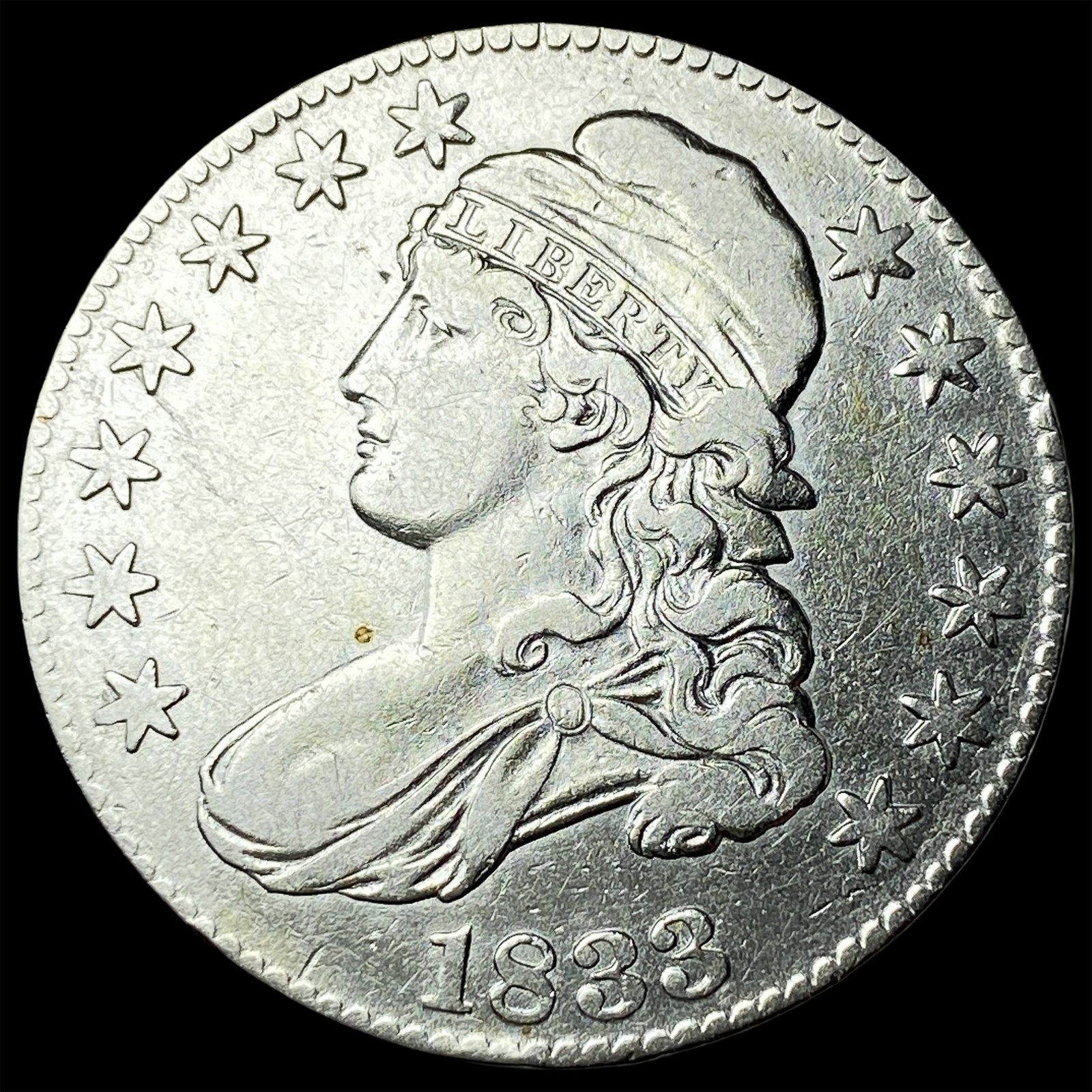 1833 Capped Bust Half Dollar NEARLY UNCIRCULATED (1 of 2)