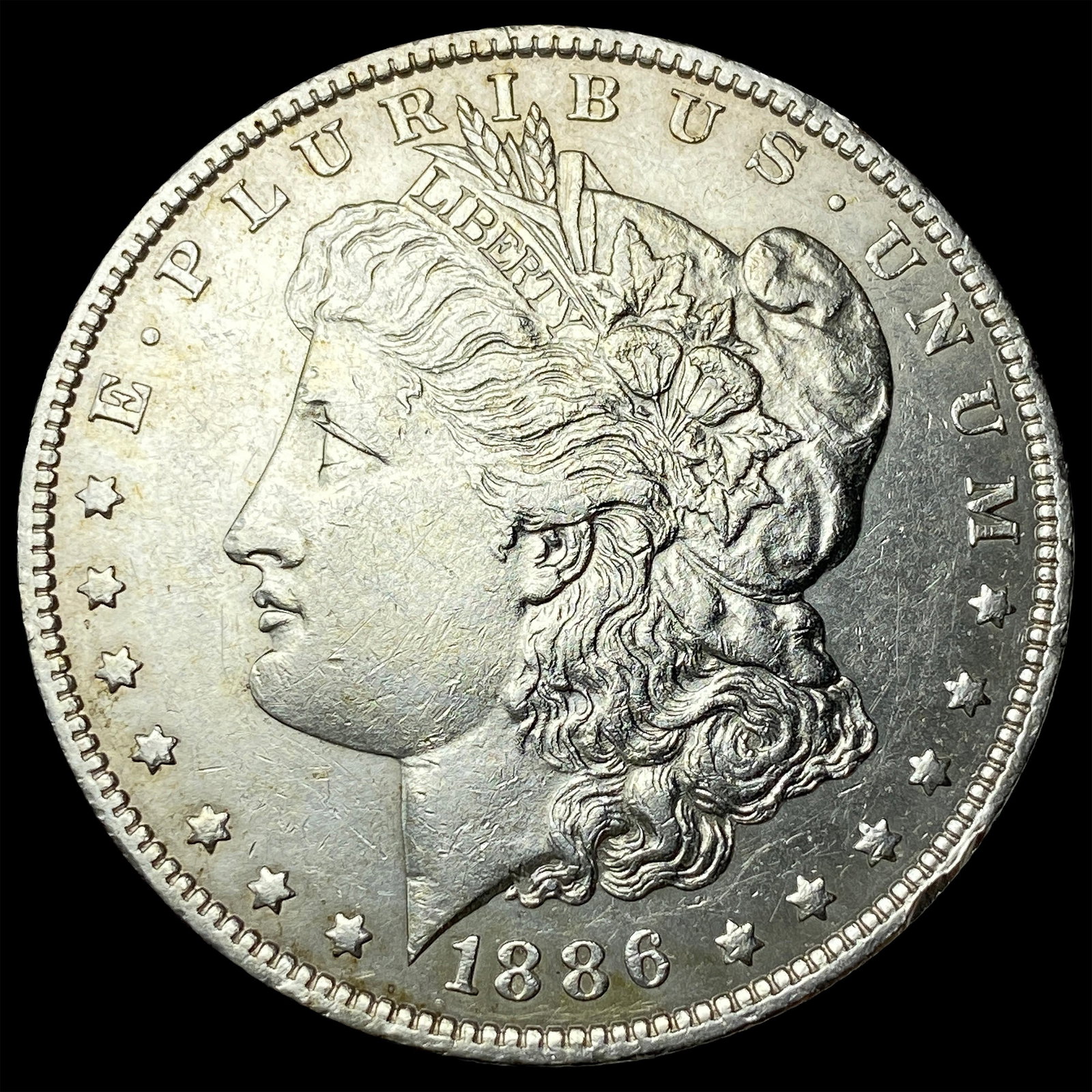 1886-O Silver Morgan Dollar CLOSELY UNCIRCULATED: 1886-O Silver Morgan Dollar CLOSELY UNCIRCULATED