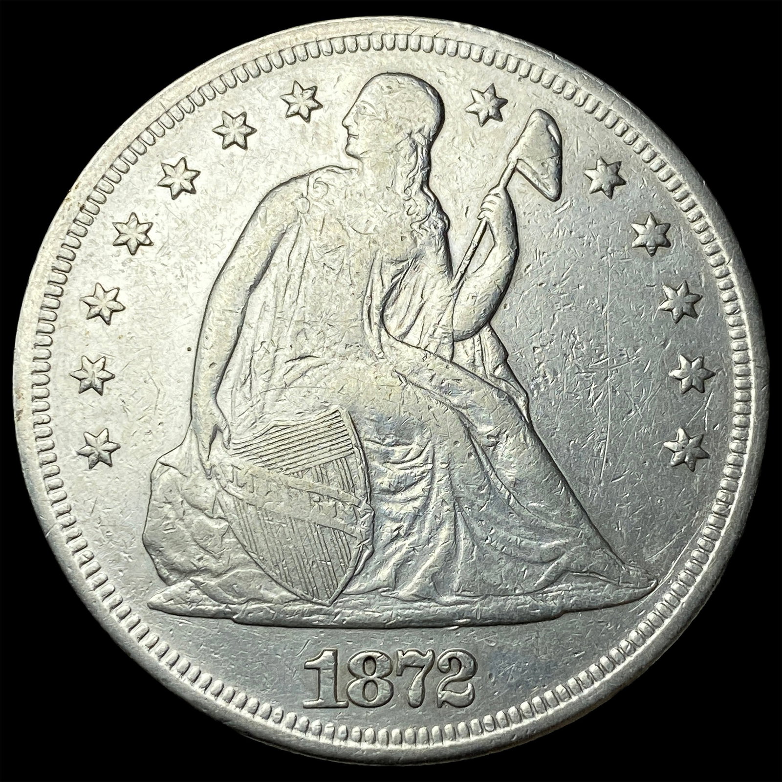 1872 Silver Seated Liberty Dollar NEARLY UNCIRCULATED (1 of 2)