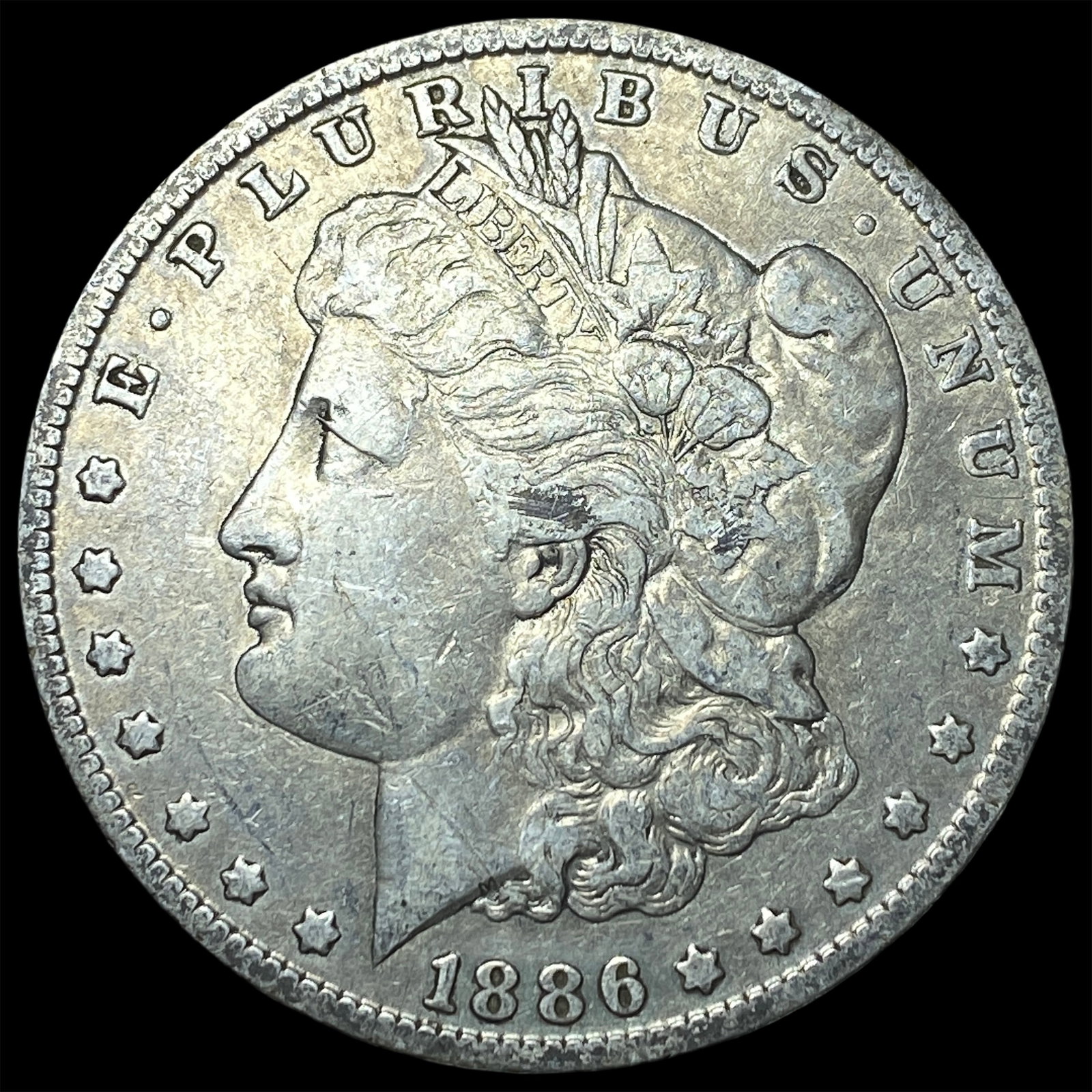 1886-O Silver Morgan Dollar NEARLY UNCIRCULATED: 1886-O Silver Morgan Dollar NEARLY UNCIRCULATED