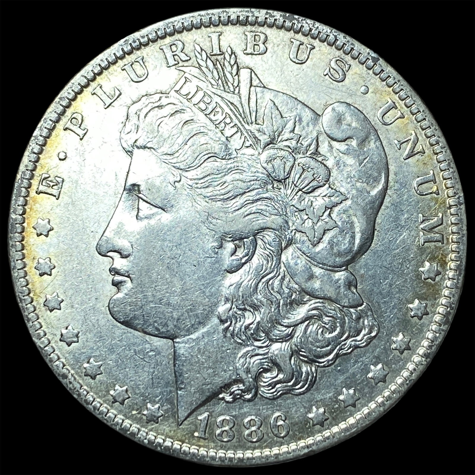 1886-O Silver Morgan Dollar NEARLY UNCIRCULATED (1 of 2)