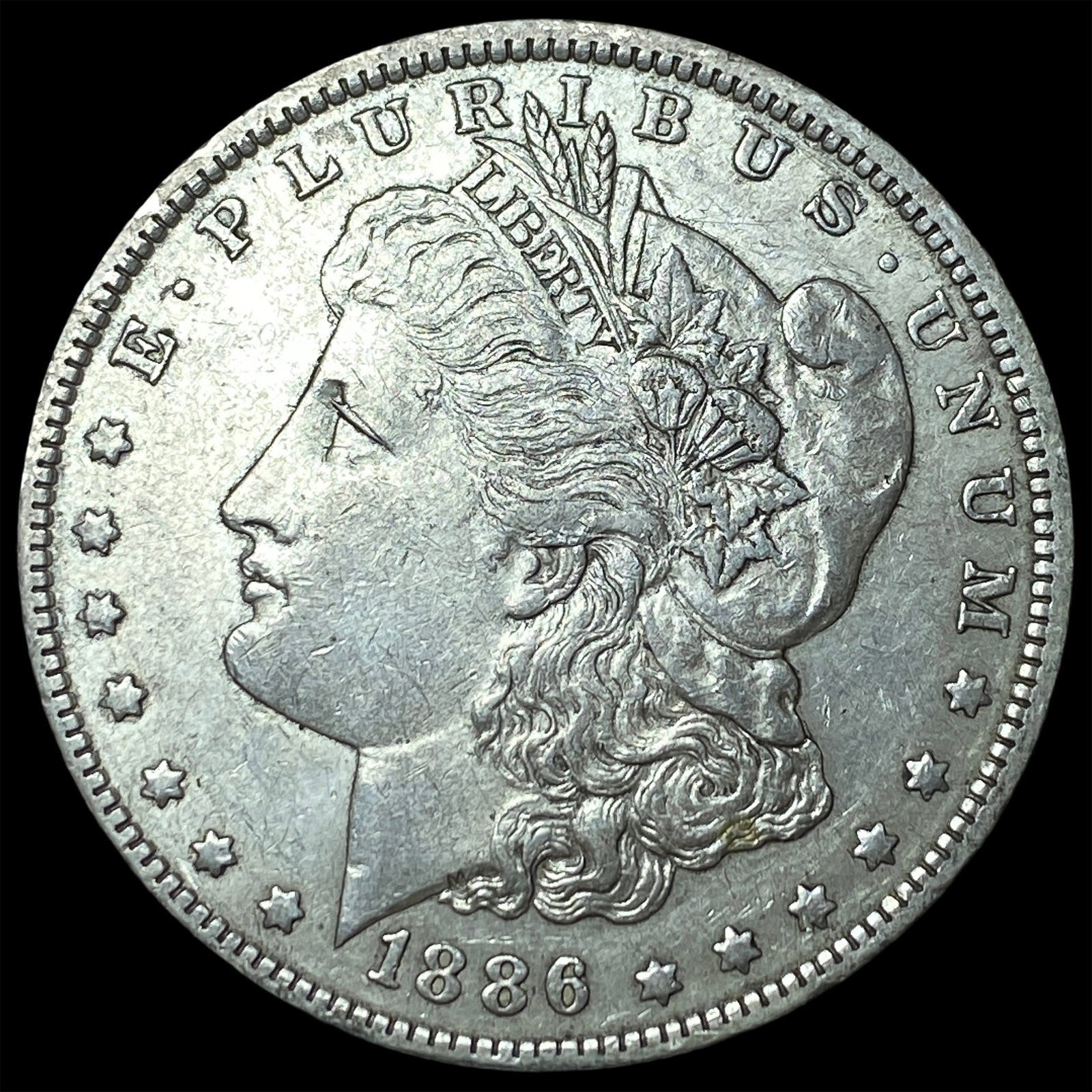 1886-O Silver Morgan Dollar NEARLY UNCIRCULATED: 1886-O Silver Morgan Dollar NEARLY UNCIRCULATED