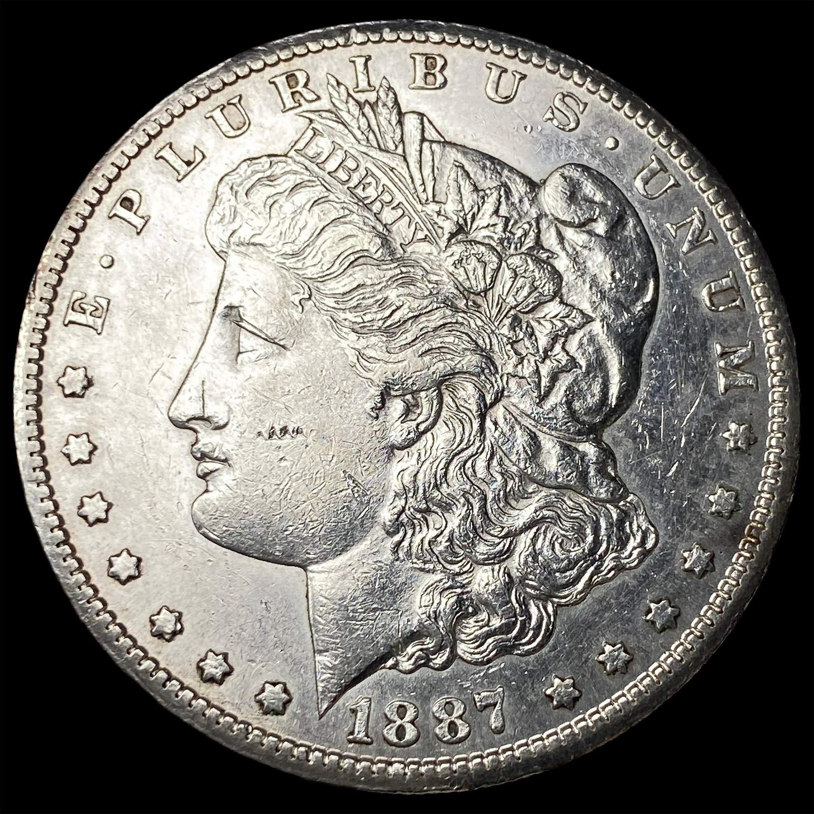 1887-S Silver Morgan Dollar CLOSELY UNCIRCULATED (1 of 2)