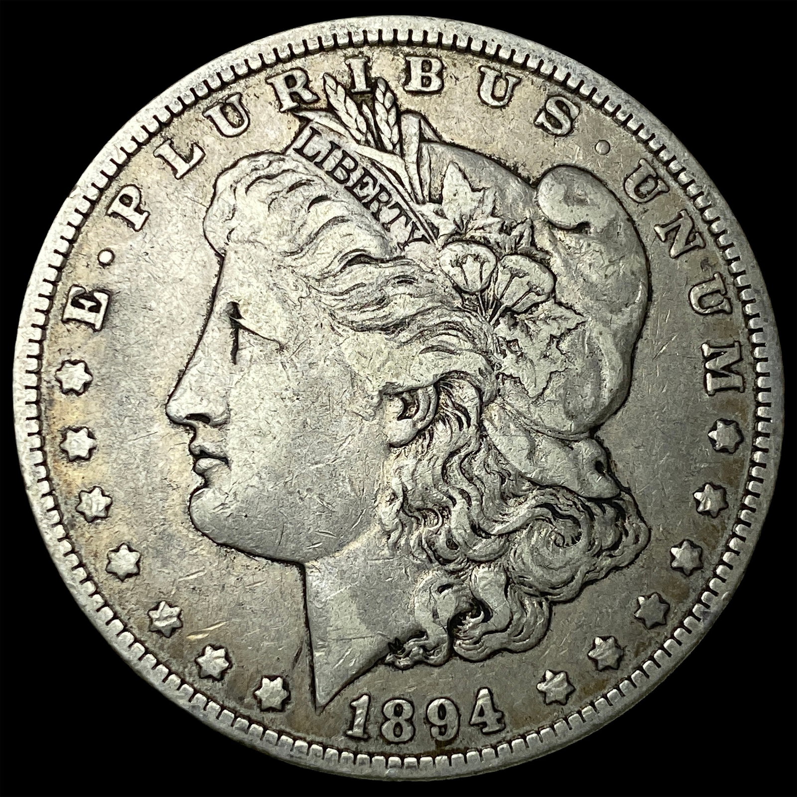 1894-O Morgan Silver Dollar ABOUT UNCIRCULATED: 1894-O Morgan Silver Dollar ABOUT UNCIRCULATED
