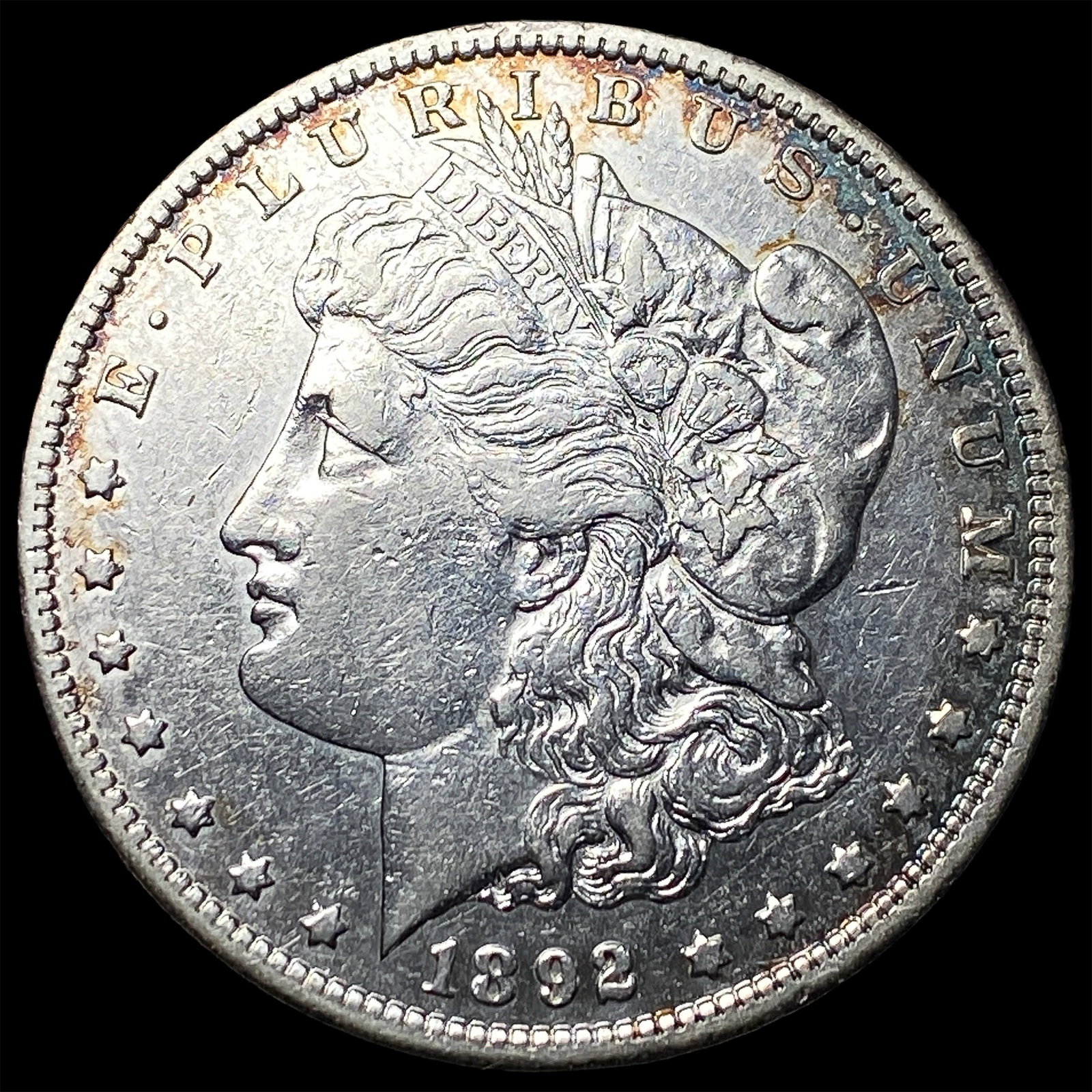 1892-CC Silver Morgan Dollar NEARLY UNCIRCULATED (1 of 2)