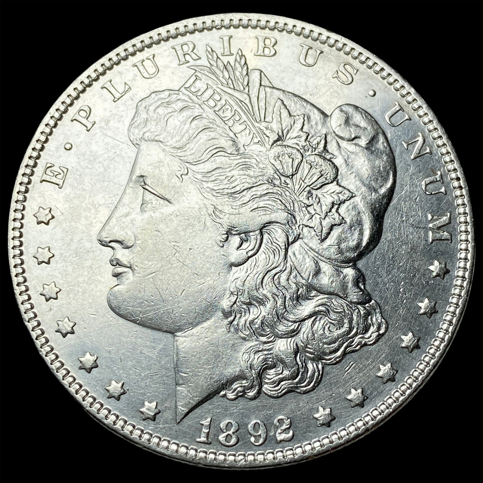 1892 Morgan Silver Dollar CLOSELY UNCIRCULATED (1 of 2)