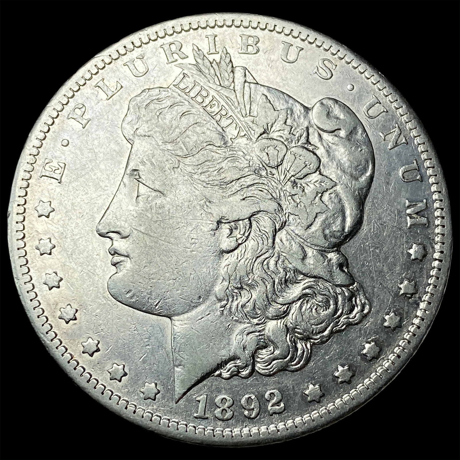 1892-CC Silver Morgan Dollar NEARLY UNCIRCULATED: 1892-CC Silver Morgan Dollar NEARLY UNCIRCULATED