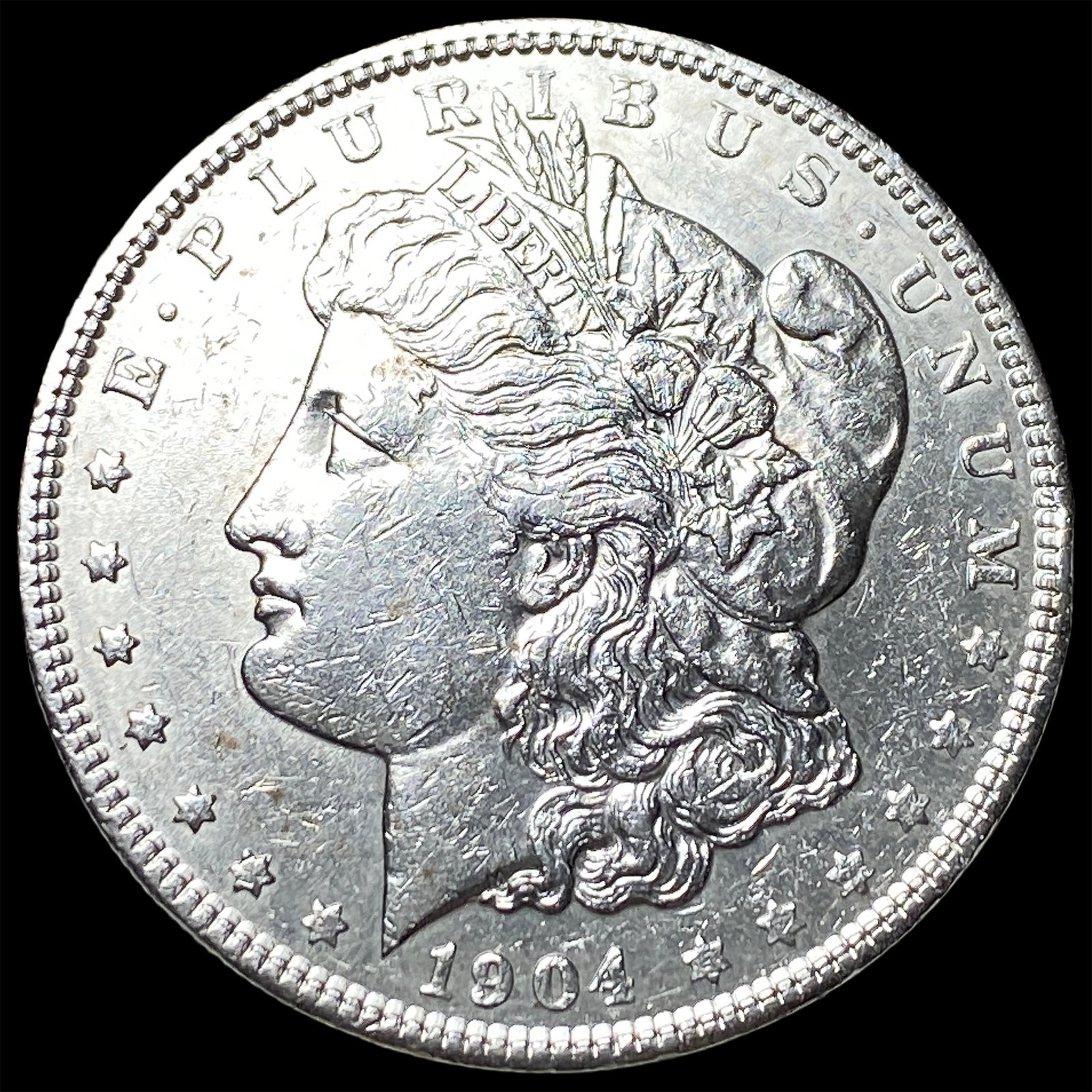 1904 Silver Morgan Dollar CLOSELY UNCIRCULATED: 1904 Silver Morgan Dollar CLOSELY UNCIRCULATED