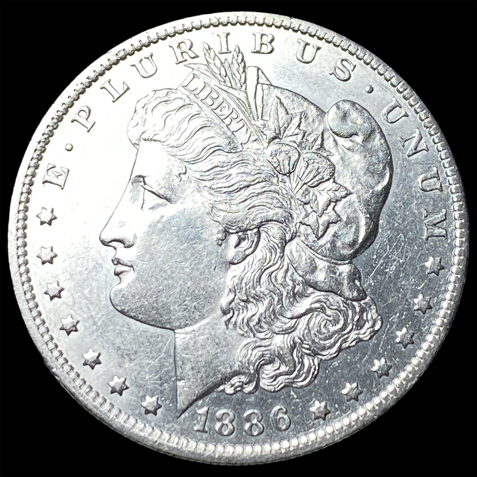 1886-O Silver Morgan Dollar CLOSELY UNCIRCULATED: 1886-O Silver Morgan Dollar CLOSELY UNCIRCULATED