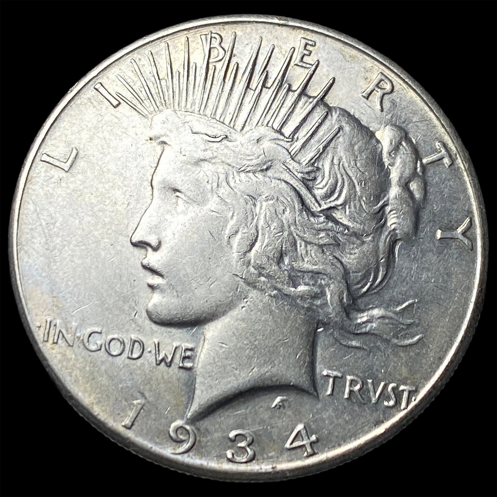 1934 Silver Peace Dollar CLOSELY UNCIRCULATED (1 of 2)