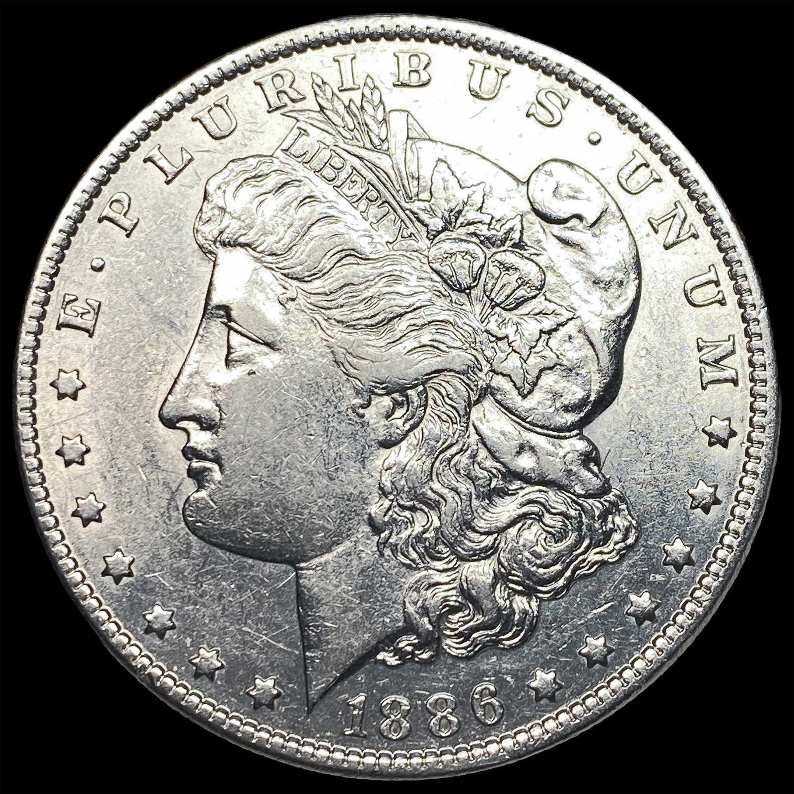 1886-O Silver Morgan Dollar CLOSELY UNCIRCULATED: 1886-O Silver Morgan Dollar CLOSELY UNCIRCULATED