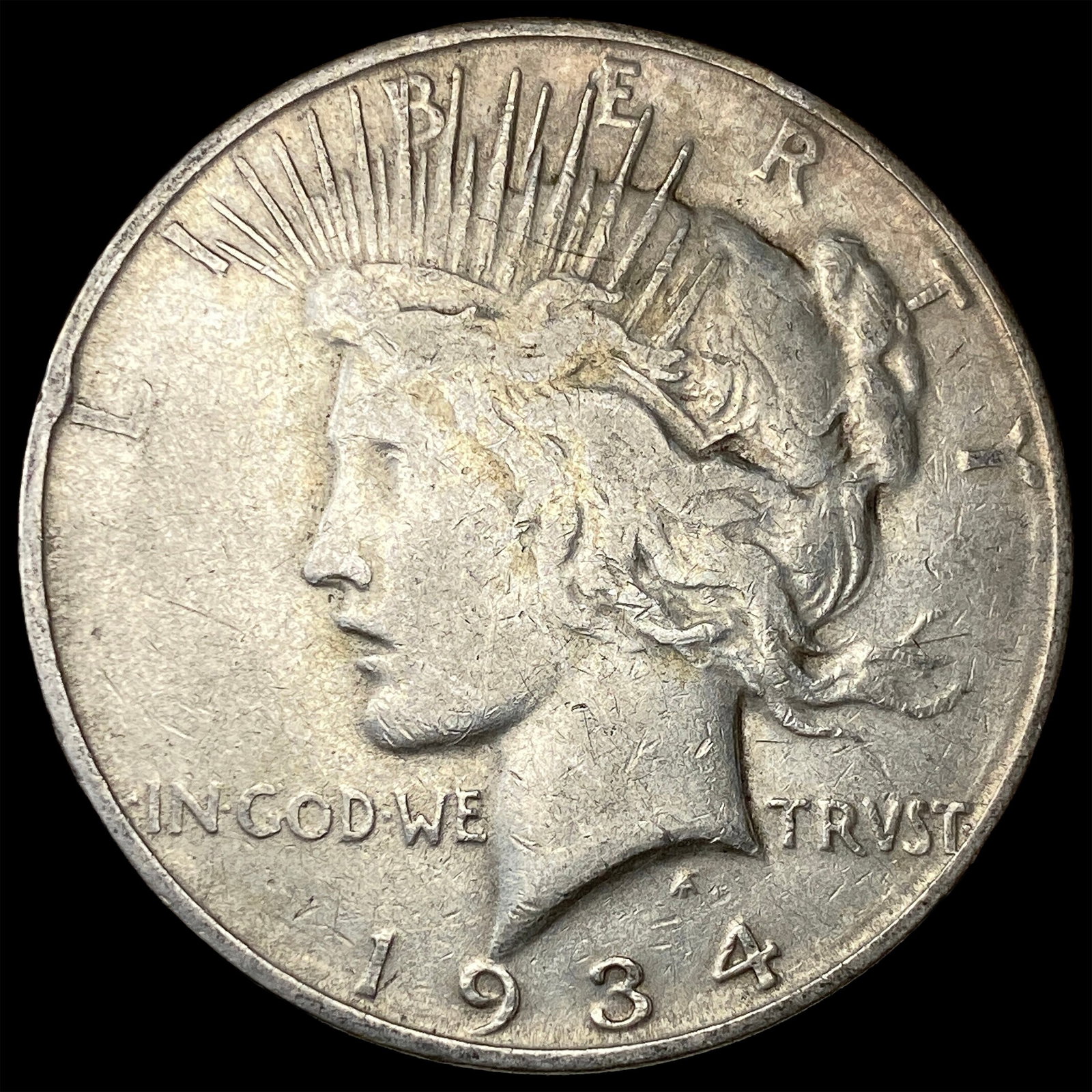 1934-D Silver Peace Dollar ABOUT UNCIRCULATED: 1934-D Silver Peace Dollar ABOUT UNCIRCULATED