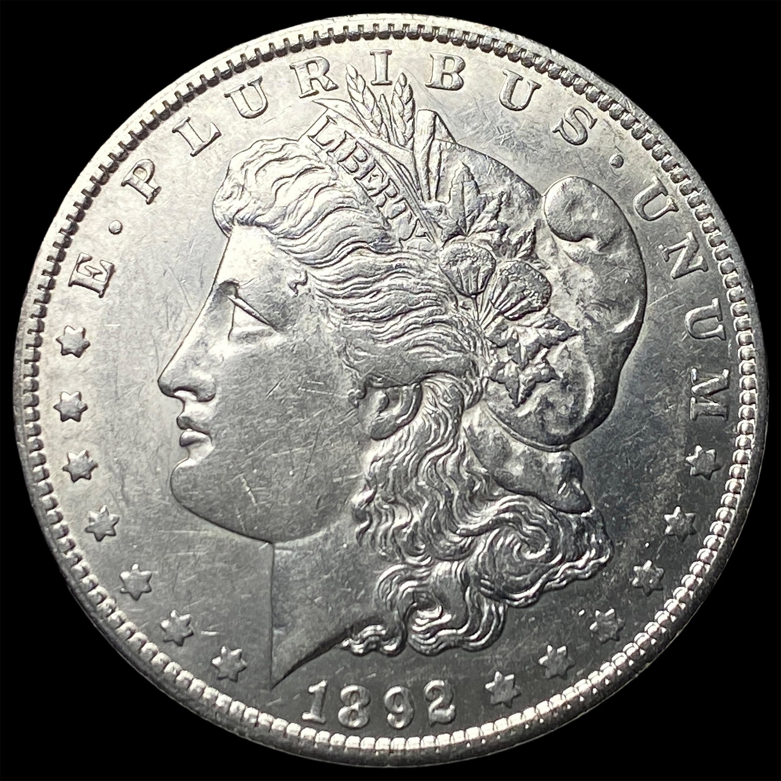 1892-O Silver Morgan Dollar CLOSELY UNCIRCULATED (1 of 2)