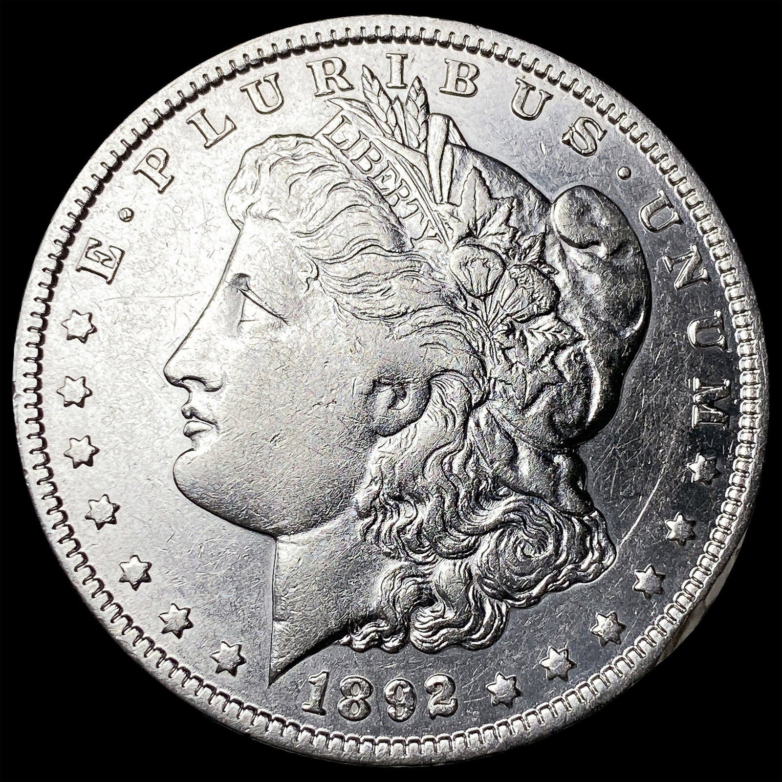 1892-O Silver Morgan Dollar NEARLY UNCIRCULATED (1 of 2)