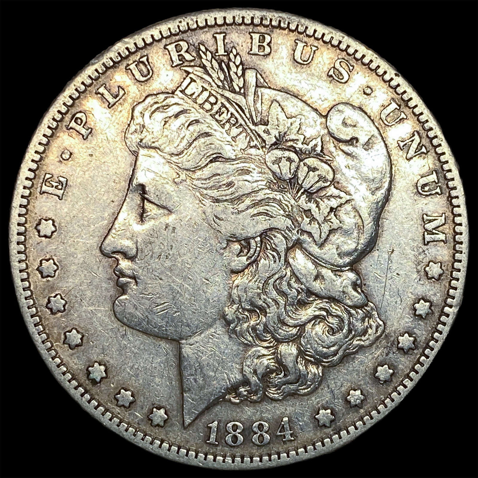 1884-S Silver Morgan Dollar ABOUT UNCIRCULATED: 1884-S Silver Morgan Dollar ABOUT UNCIRCULATED