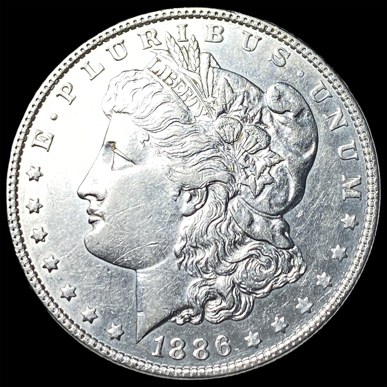 1886 Morgan Silver Dollar CLOSELY UNCIRCULATED: 1886 Morgan Silver Dollar CLOSELY UNCIRCULATED