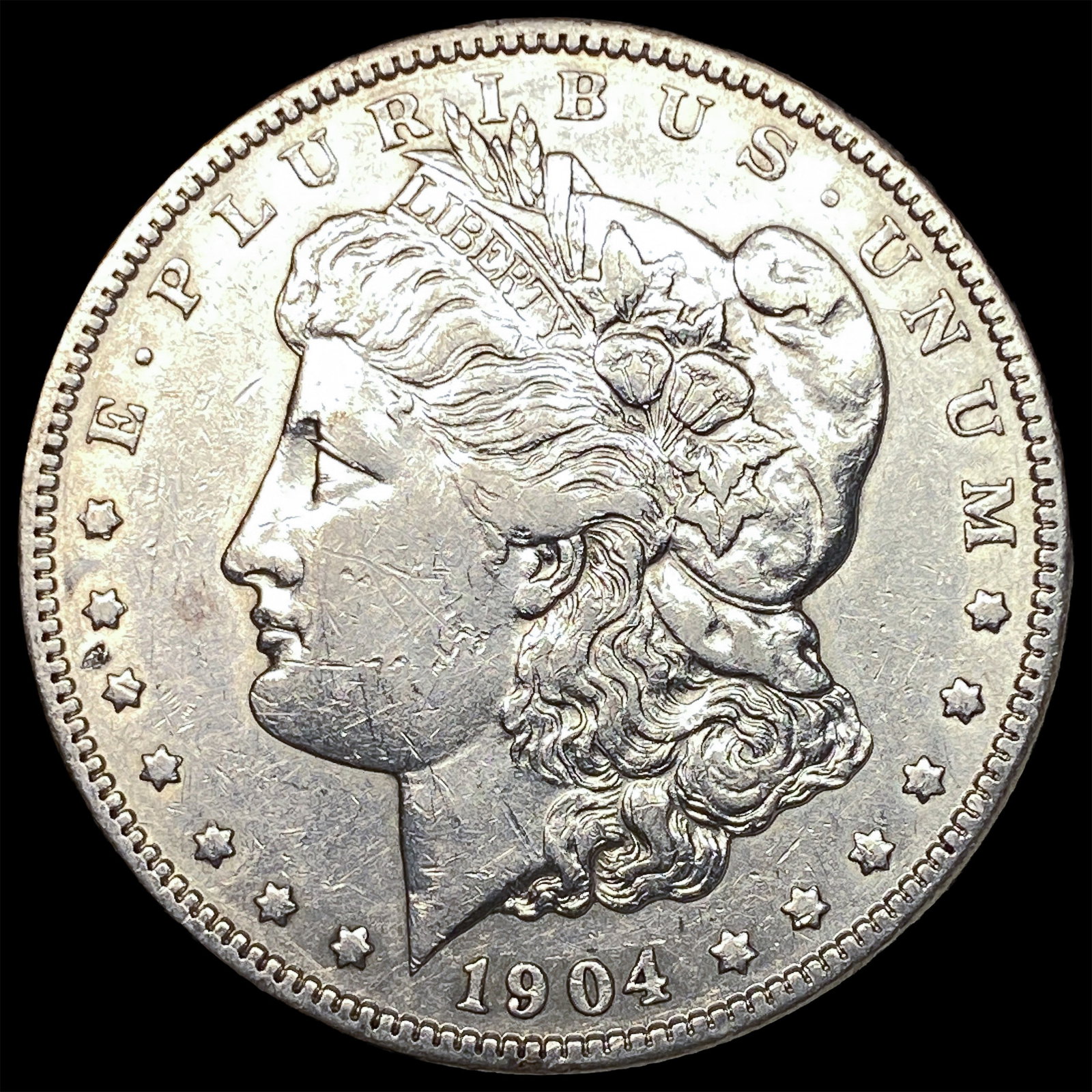 1904 Silver Morgan Dollar CLOSELY UNCIRCULATED: 1904 Silver Morgan Dollar CLOSELY UNCIRCULATED