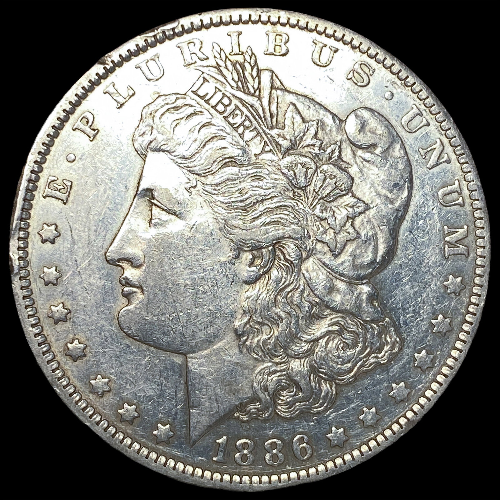 1886-O Silver Morgan Dollar CLOSELY UNCIRCULATED: 1886-O Silver Morgan Dollar CLOSELY UNCIRCULATED