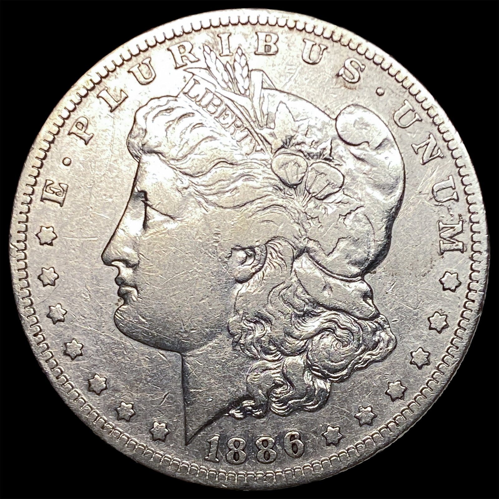1886 Morgan Silver Dollar NEARLY UNCIRCULATED: 1886 Morgan Silver Dollar NEARLY UNCIRCULATED