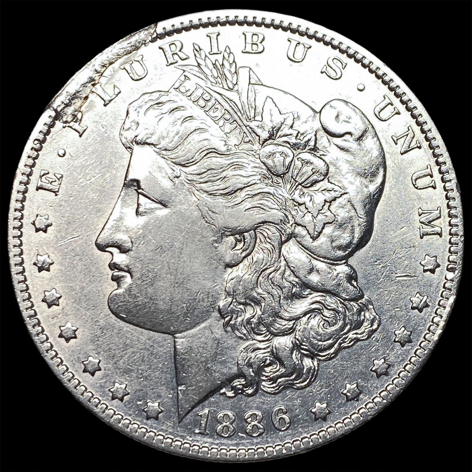1886-O Silver Morgan Dollar CLOSELY UNCIRCULATED: 1886-O Silver Morgan Dollar CLOSELY UNCIRCULATED