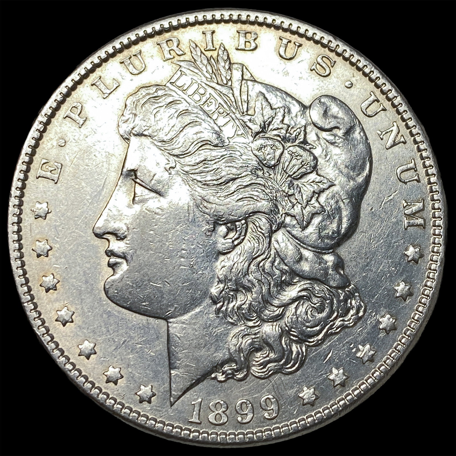1899 Morgan Silver Dollar CLOSELY UNCIRCULATED: 1899 Morgan Silver Dollar CLOSELY UNCIRCULATED