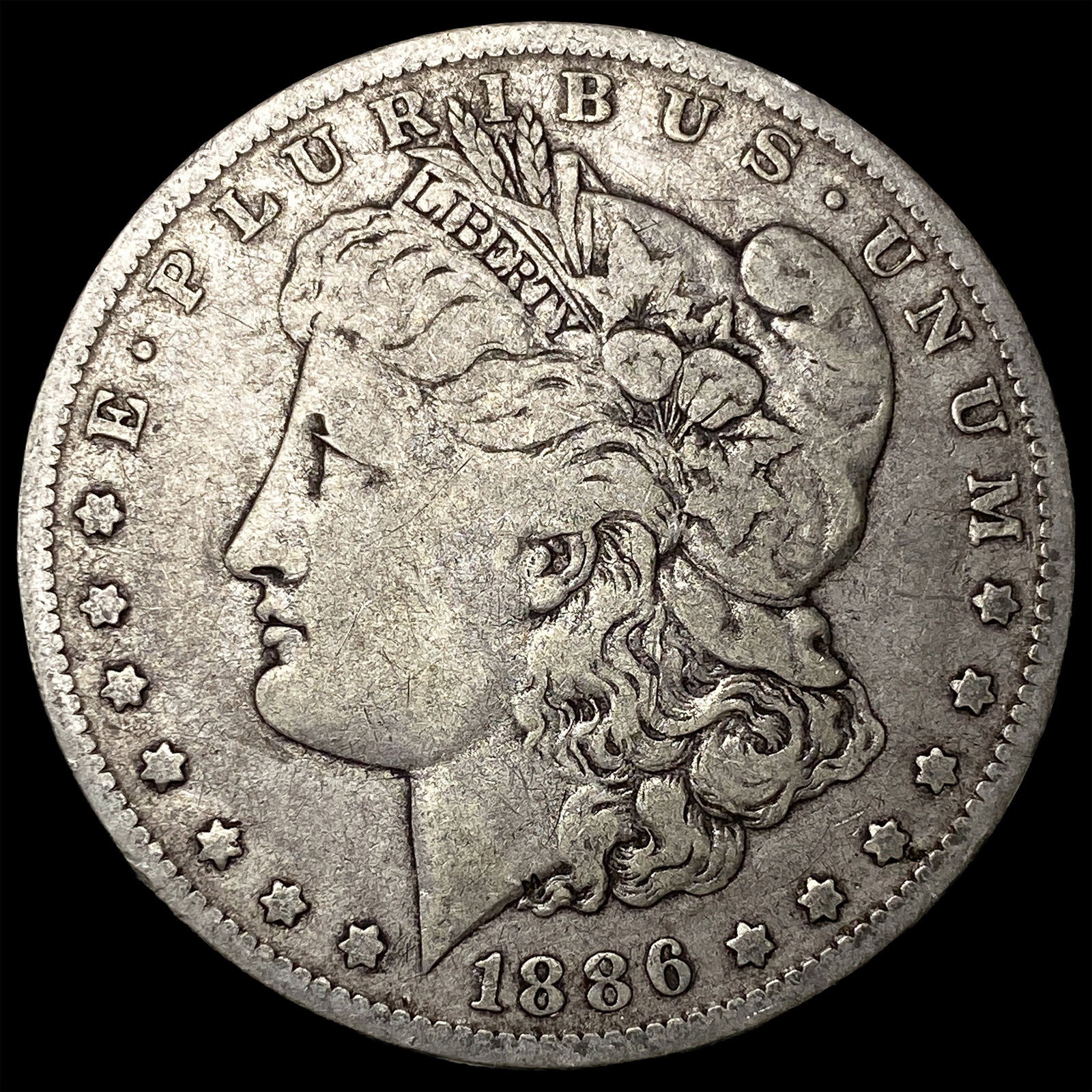 1886-O Silver Morgan Dollar ABOUT UNCIRCULATED: 1886-O Silver Morgan Dollar ABOUT UNCIRCULATED