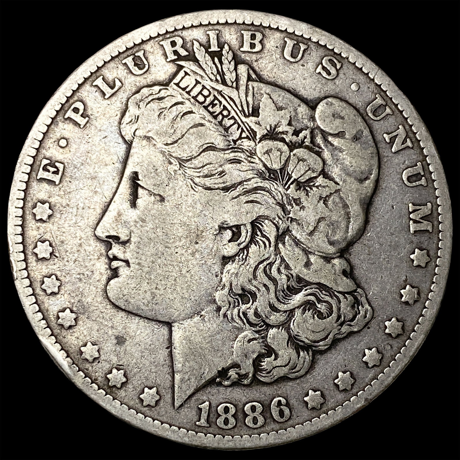 1886-O Silver Morgan Dollar ABOUT UNCIRCULATED: 1886-O Silver Morgan Dollar ABOUT UNCIRCULATED