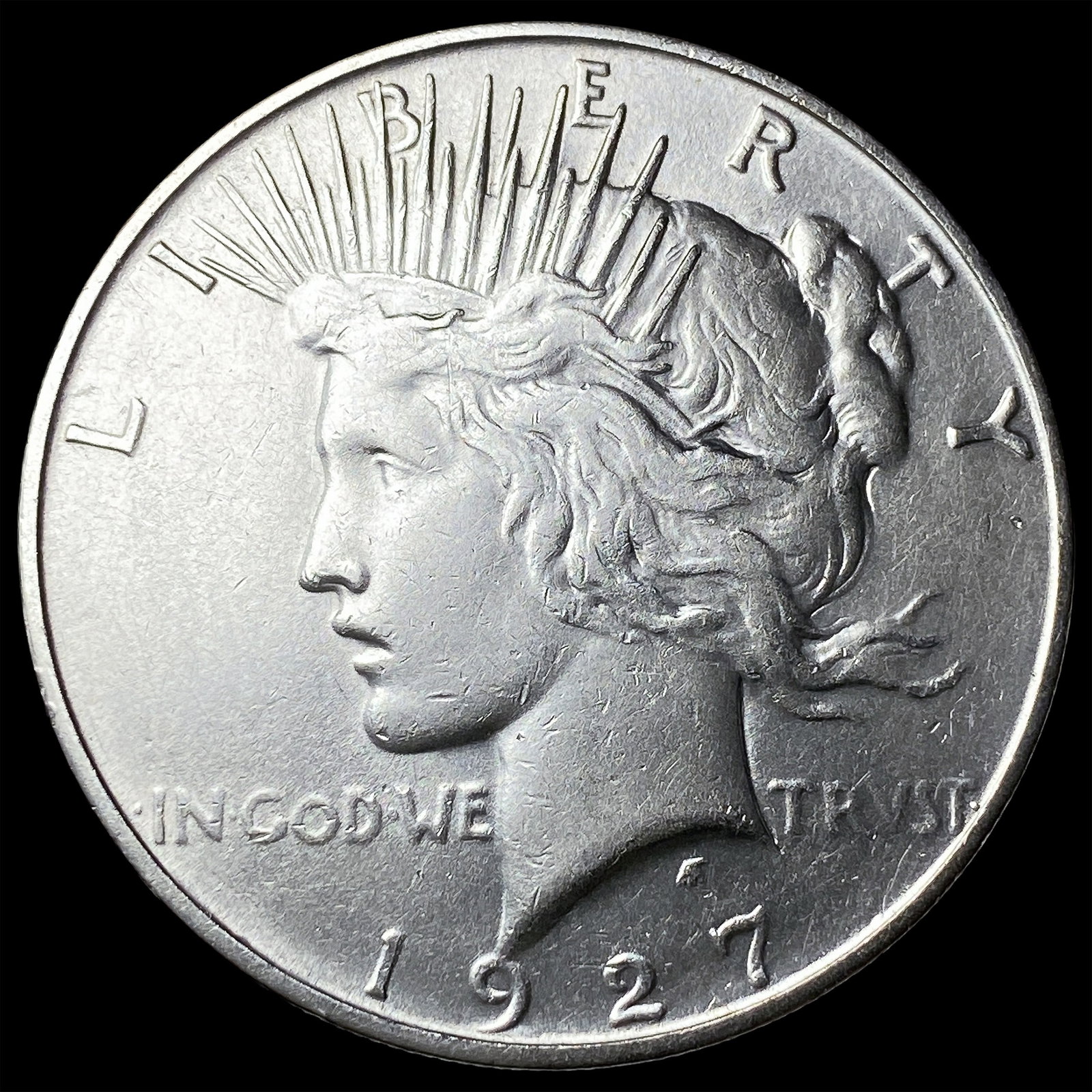 1927-D Silver Peace Dollar ABOUT UNCIRCULATED: 1927-D Silver Peace Dollar ABOUT UNCIRCULATED