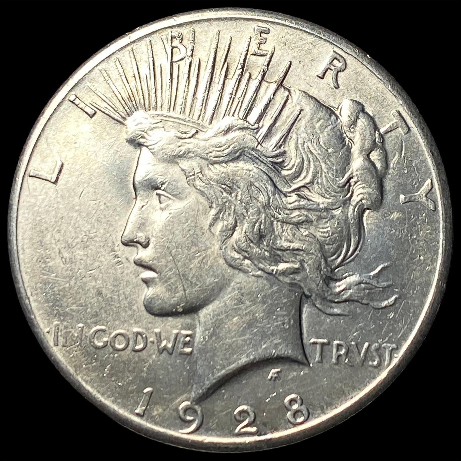 1928 Peace Silver Dollar CLOSELY UNCIRCULATED (1 of 2)