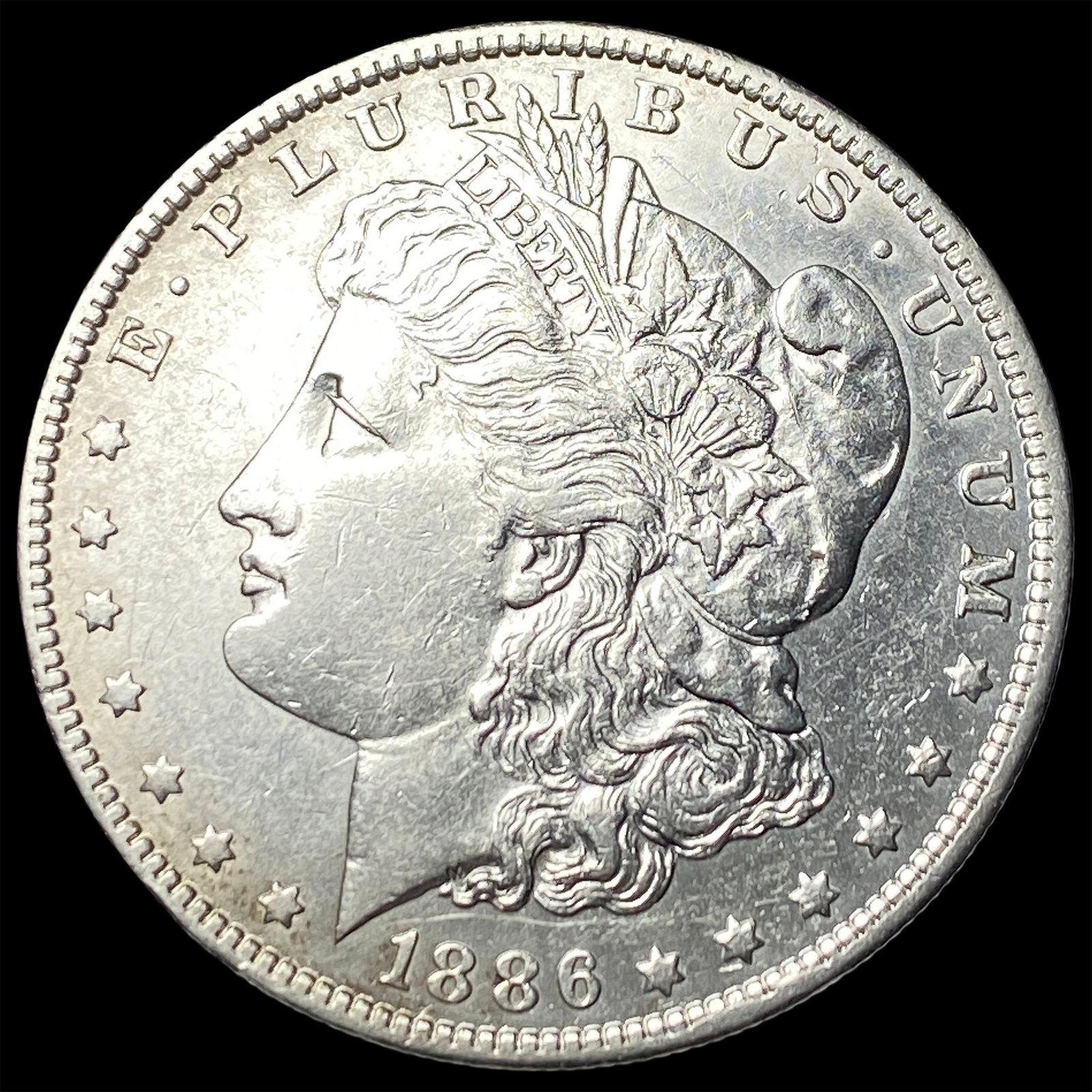 1886-O Silver Morgan Dollar CLOSELY UNCIRCULATED: 1886-O Silver Morgan Dollar CLOSELY UNCIRCULATED