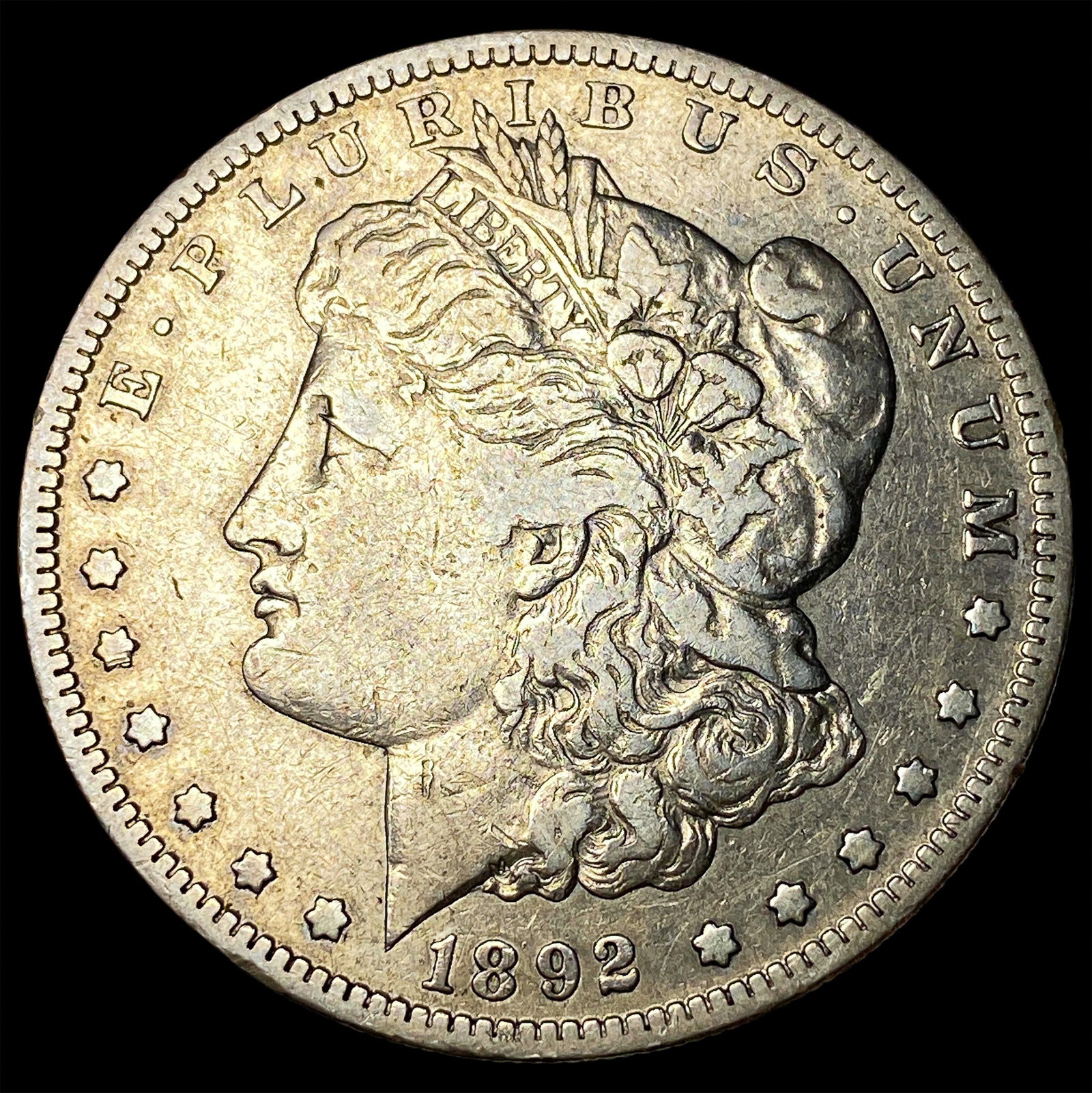 1892-S Silver Morgan Dollar ABOUT UNCIRCULATED: 1892-S Silver Morgan Dollar ABOUT UNCIRCULATED