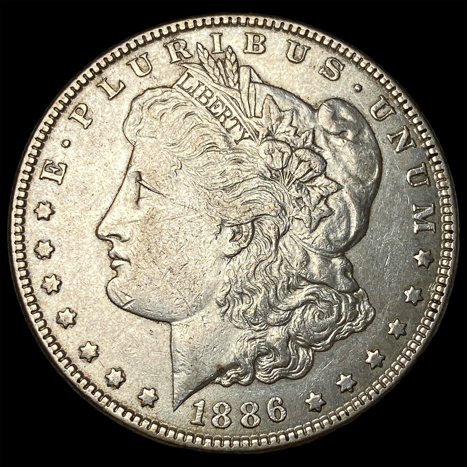 1886 Silver Morgan Dollar CLOSELY UNCIRCULATED: 1886 Silver Morgan Dollar CLOSELY UNCIRCULATED