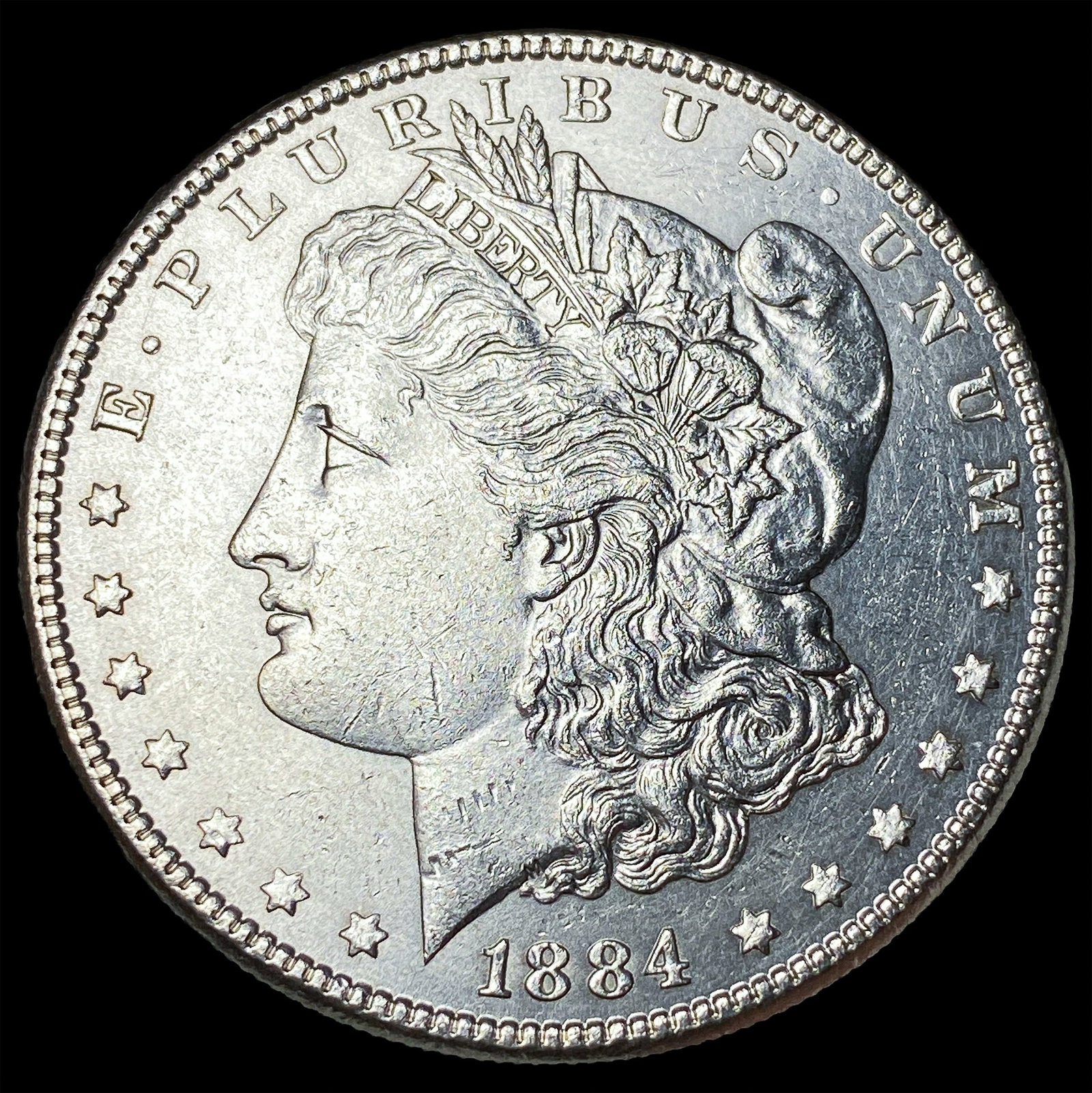 1884 Silver Morgan Dollar CLOSELY UNCIRCULATED: 1884 Silver Morgan Dollar CLOSELY UNCIRCULATED