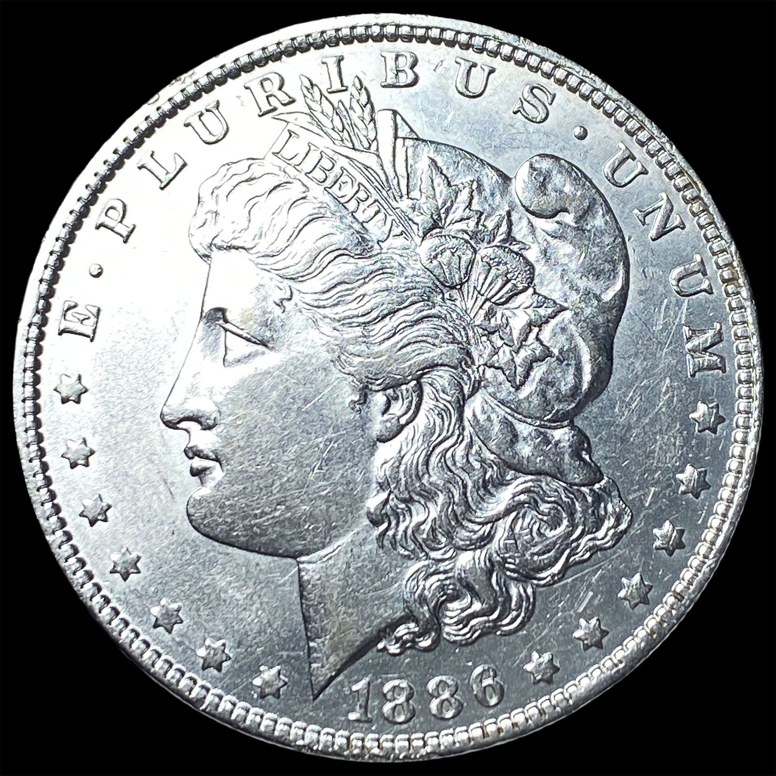 1886-O Silver Morgan Dollar CLOSELY UNCIRCULATED: 1886-O Silver Morgan Dollar CLOSELY UNCIRCULATED