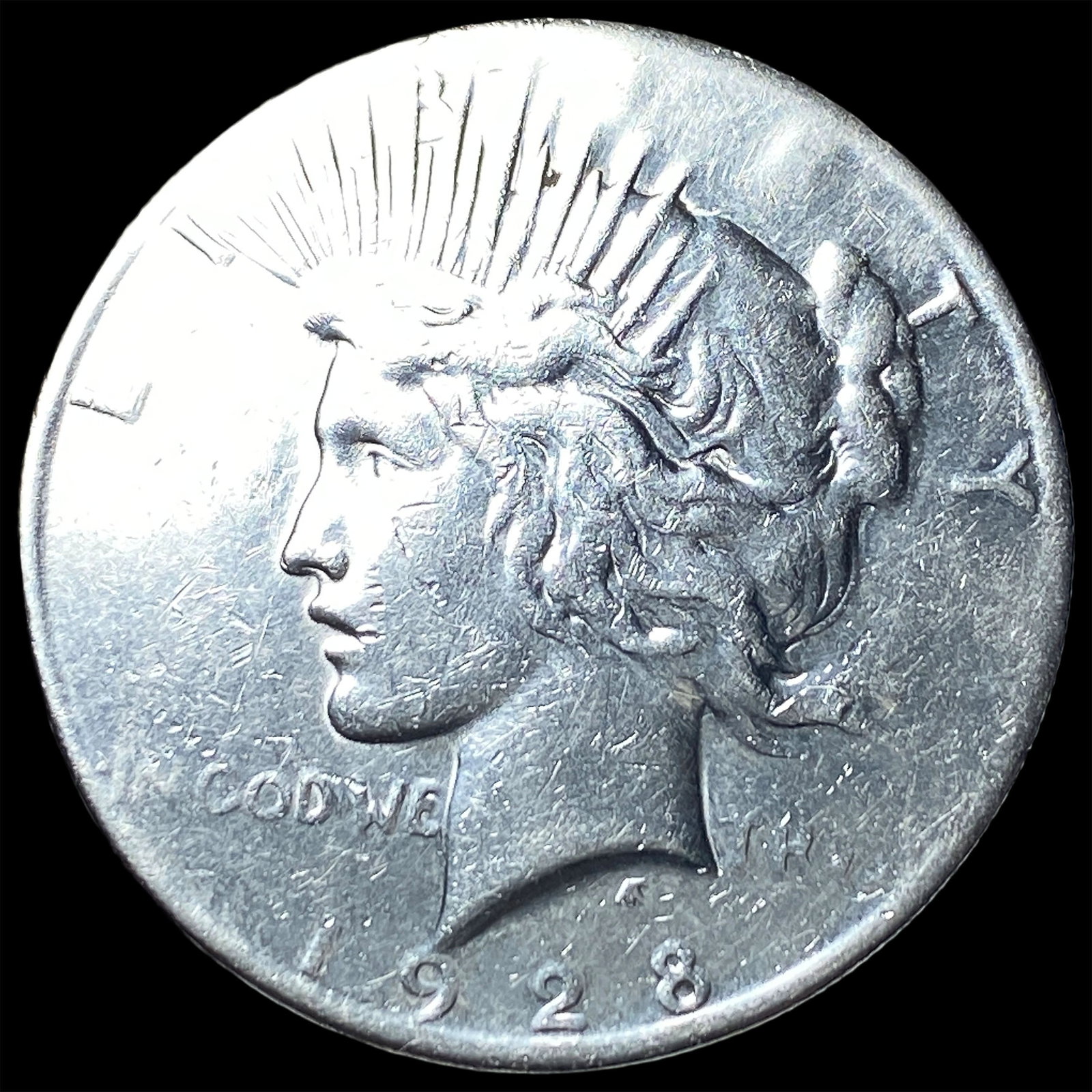 1928 Peace Silver Dollar CLOSELY UNCIRCULATED (1 of 2)