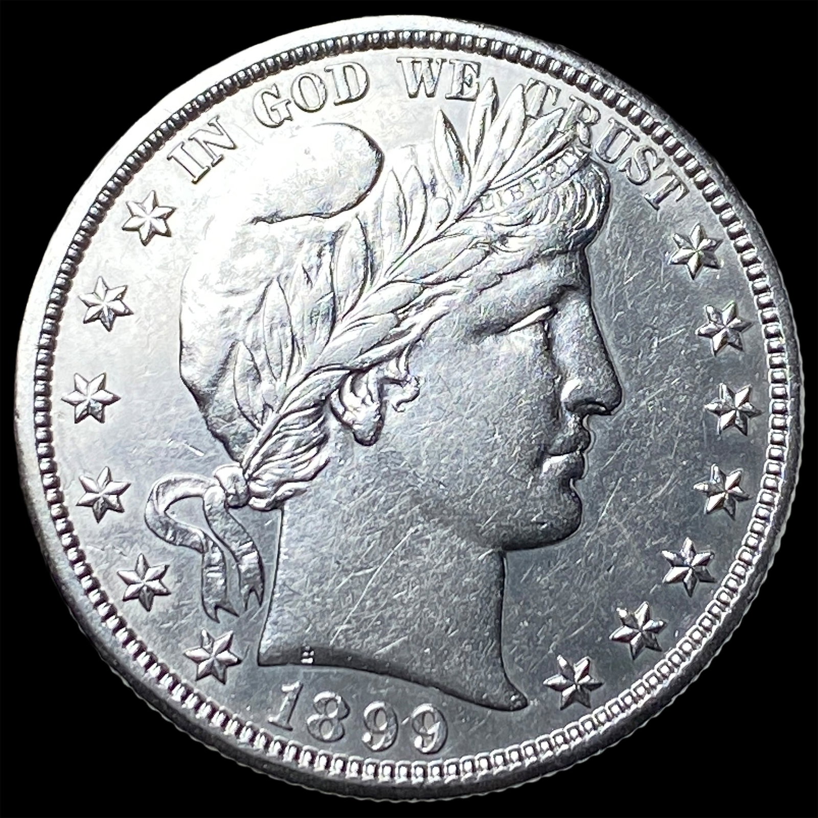 1899-O Silver Barber Half Dollar CLOSELY UNCIRCULATED: 1899-O Silver Barber Half Dollar CLOSELY UNCIRCULATED