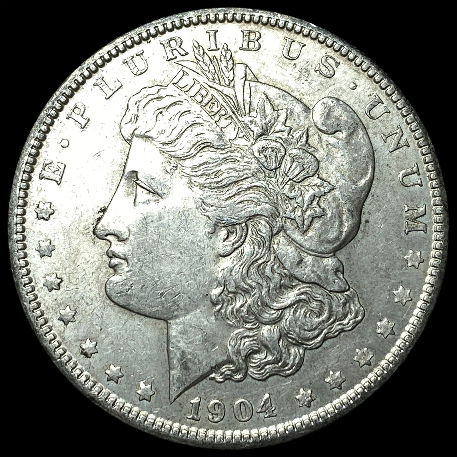 1904 Silver Morgan Dollar NEARLY UNCIRCULATED (1 of 2)