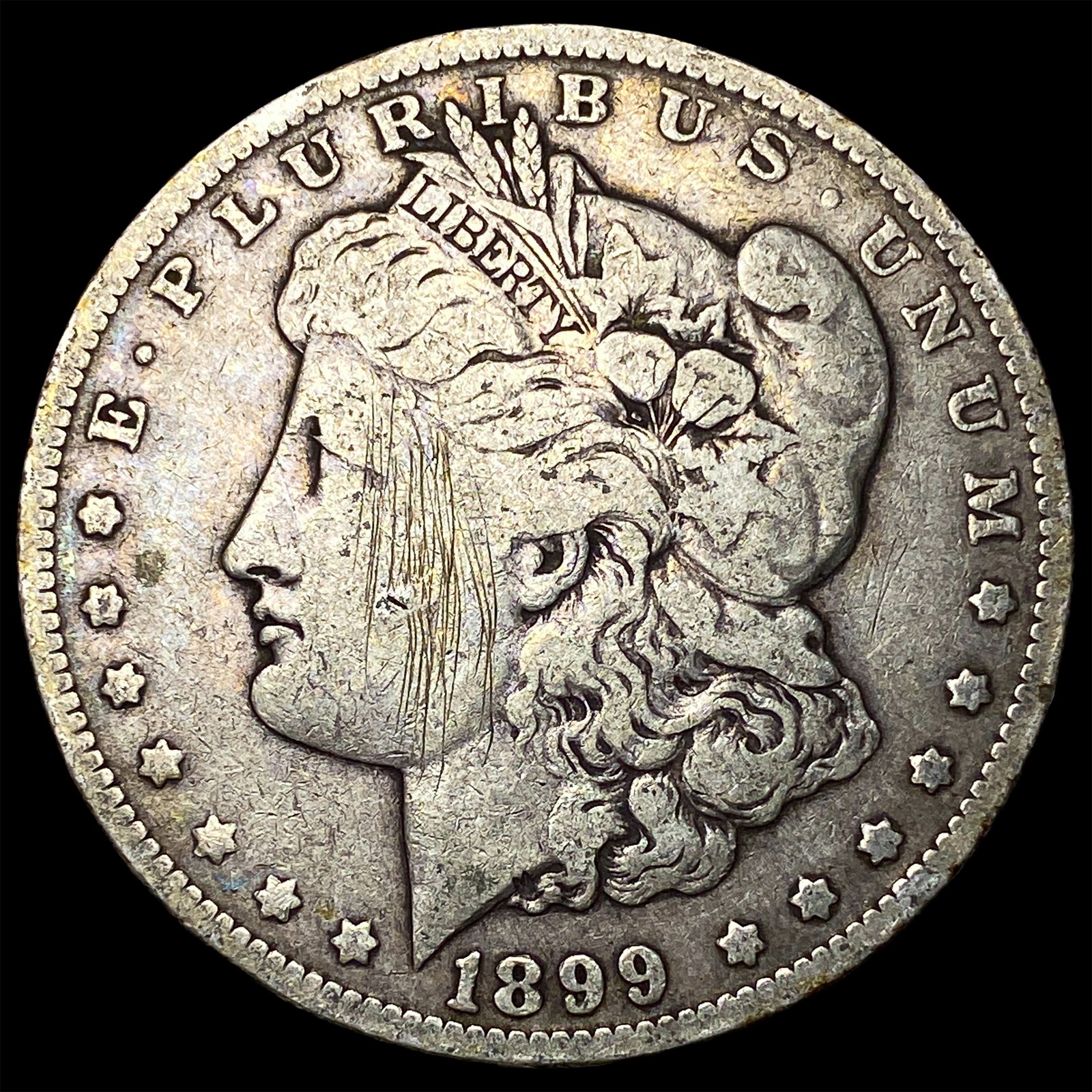 1899-O Micro O Morgan Silver Dollar ABOUT UNCIRCULATED: 1899-O Micro O Morgan Silver Dollar ABOUT UNCIRCULATED