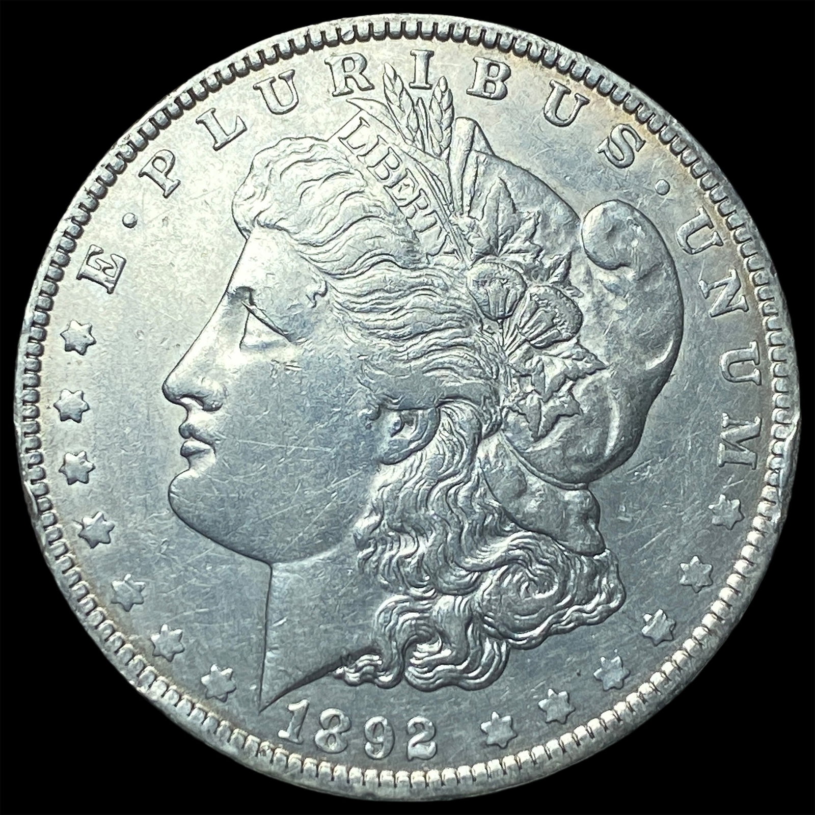 1892-O Silver Morgan Dollar CLOSELY UNCIRCULATED (1 of 2)