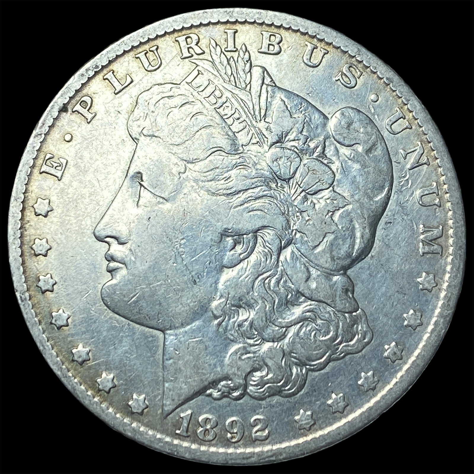 1892-O Silver Morgan Dollar NEARLY UNCIRCULATED (1 of 2)