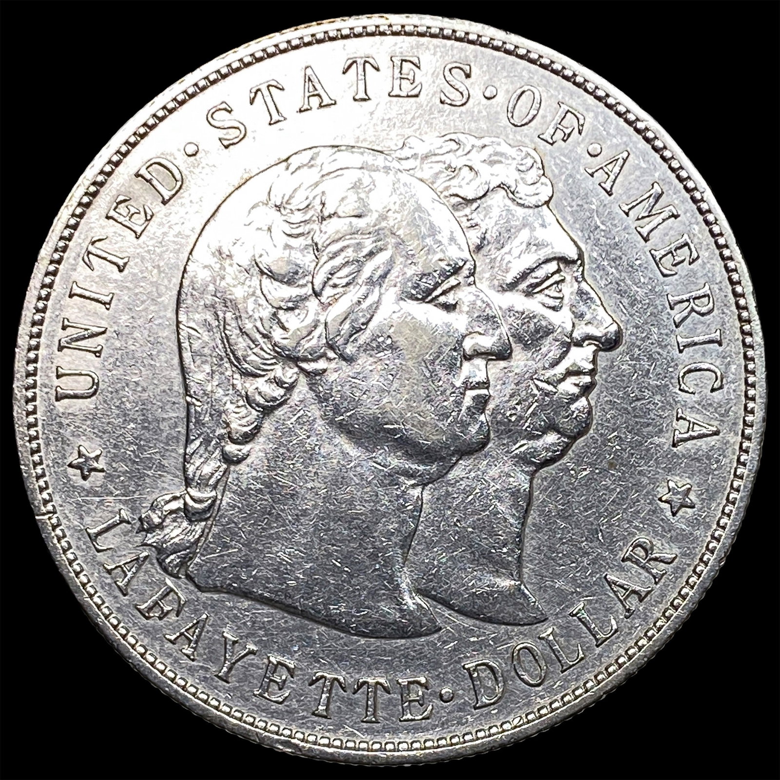 1900 Silver Lafayette Dollar CLOSELY UNCIRCULATED (1 of 2)