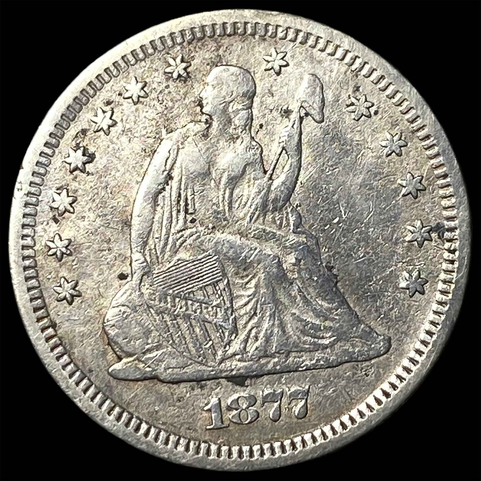 1877-S Seated Liberty Quarter NEARLY UNCIRCULATED (1 of 2)