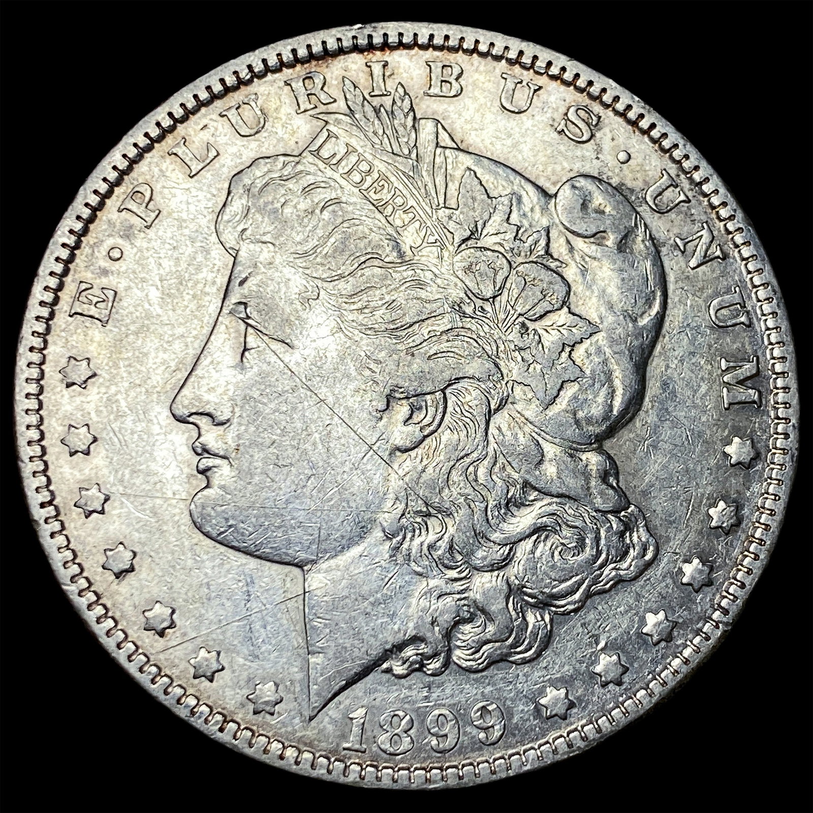 1899 Morgan Silver Dollar NEARLY UNCIRCULATED: 1899 Morgan Silver Dollar NEARLY UNCIRCULATED