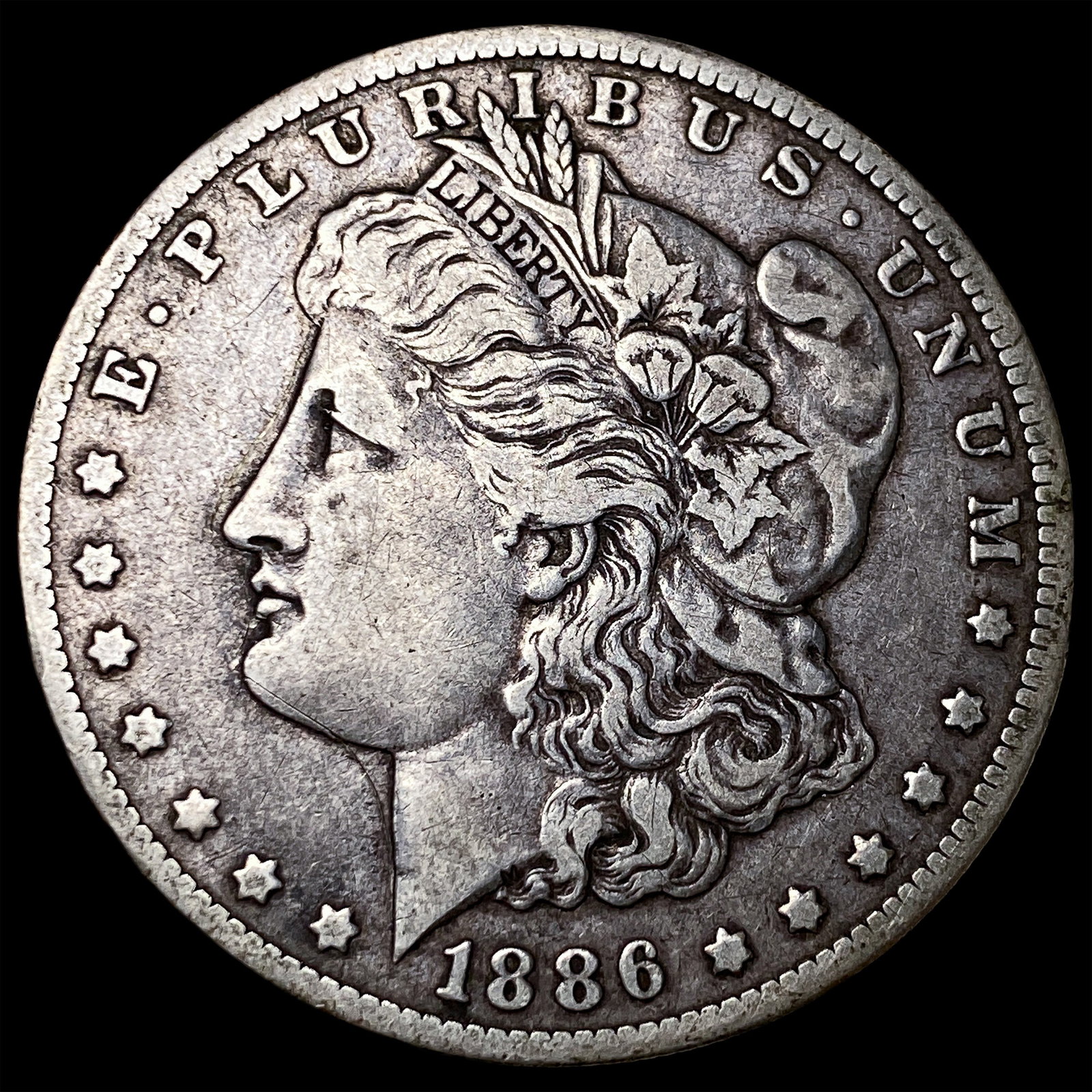 1886-O Silver Morgan Dollar ABOUT UNCIRCULATED: 1886-O Silver Morgan Dollar ABOUT UNCIRCULATED