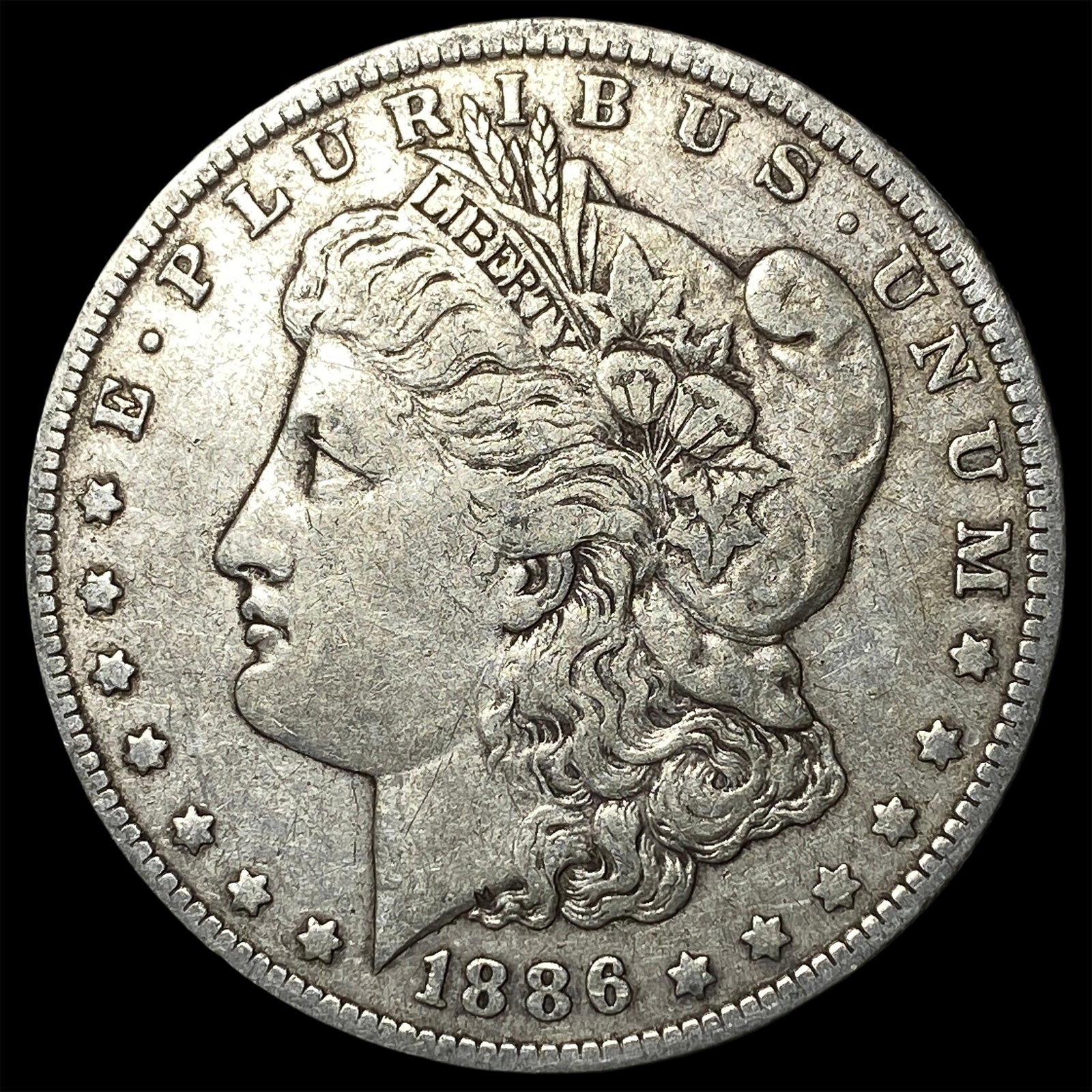 1886-O Silver Morgan Dollar CLOSELY UNCIRCULATED: 1886-O Silver Morgan Dollar CLOSELY UNCIRCULATED