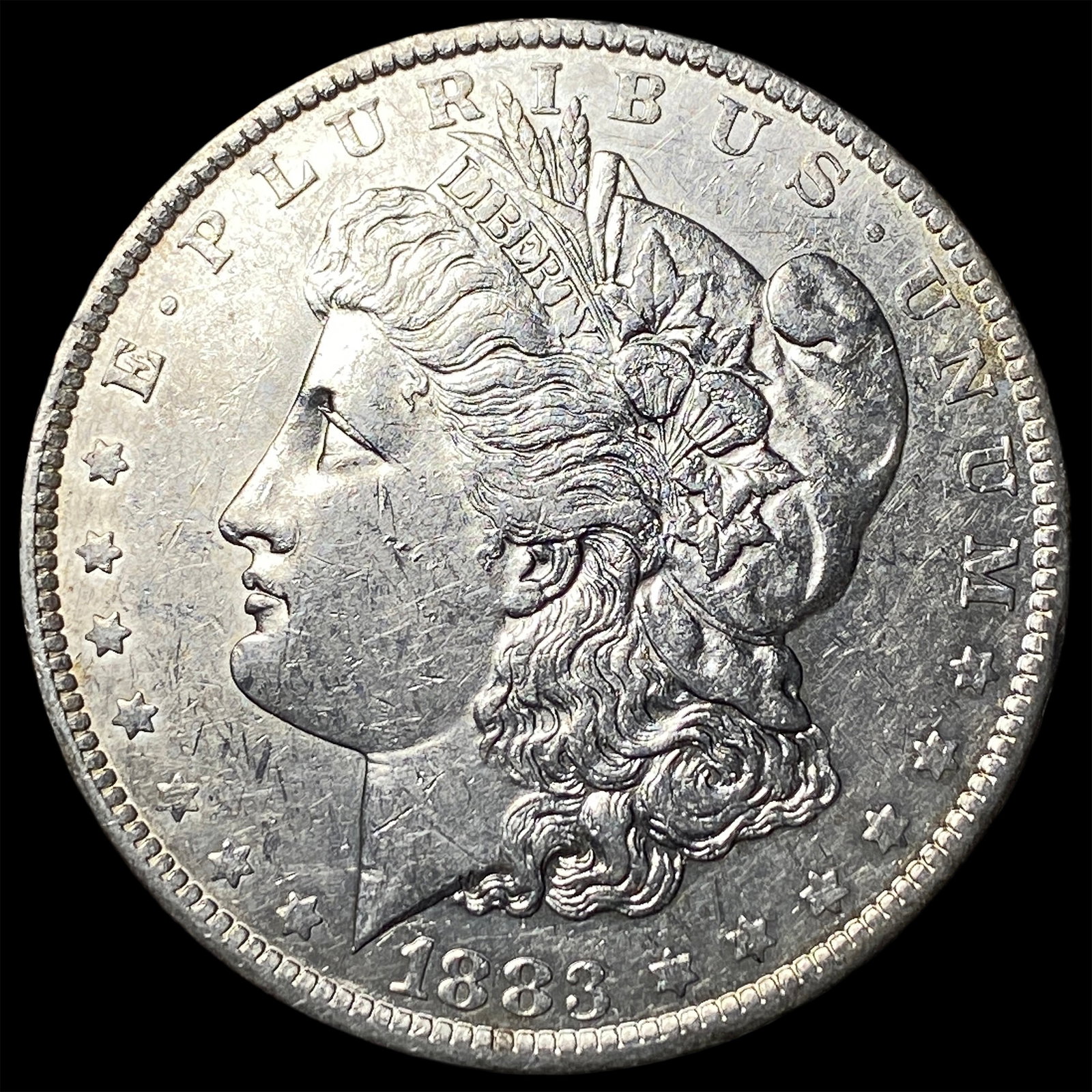 1883-O Silver Morgan Dollar CLOSELY UNCIRCULATED (1 of 2)