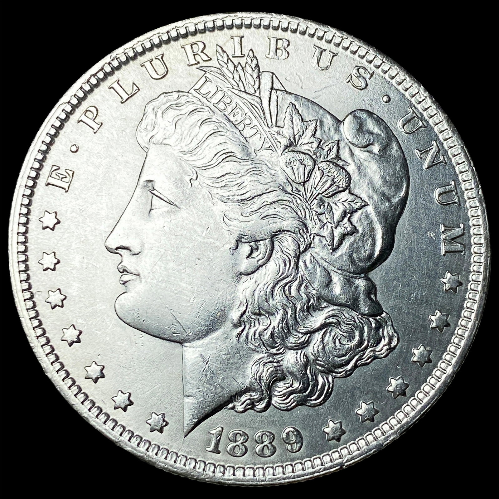 1889-O Morgan Silver Dollar CLOSELY UNCIRCULATED: 1889-O Morgan Silver Dollar CLOSELY UNCIRCULATED