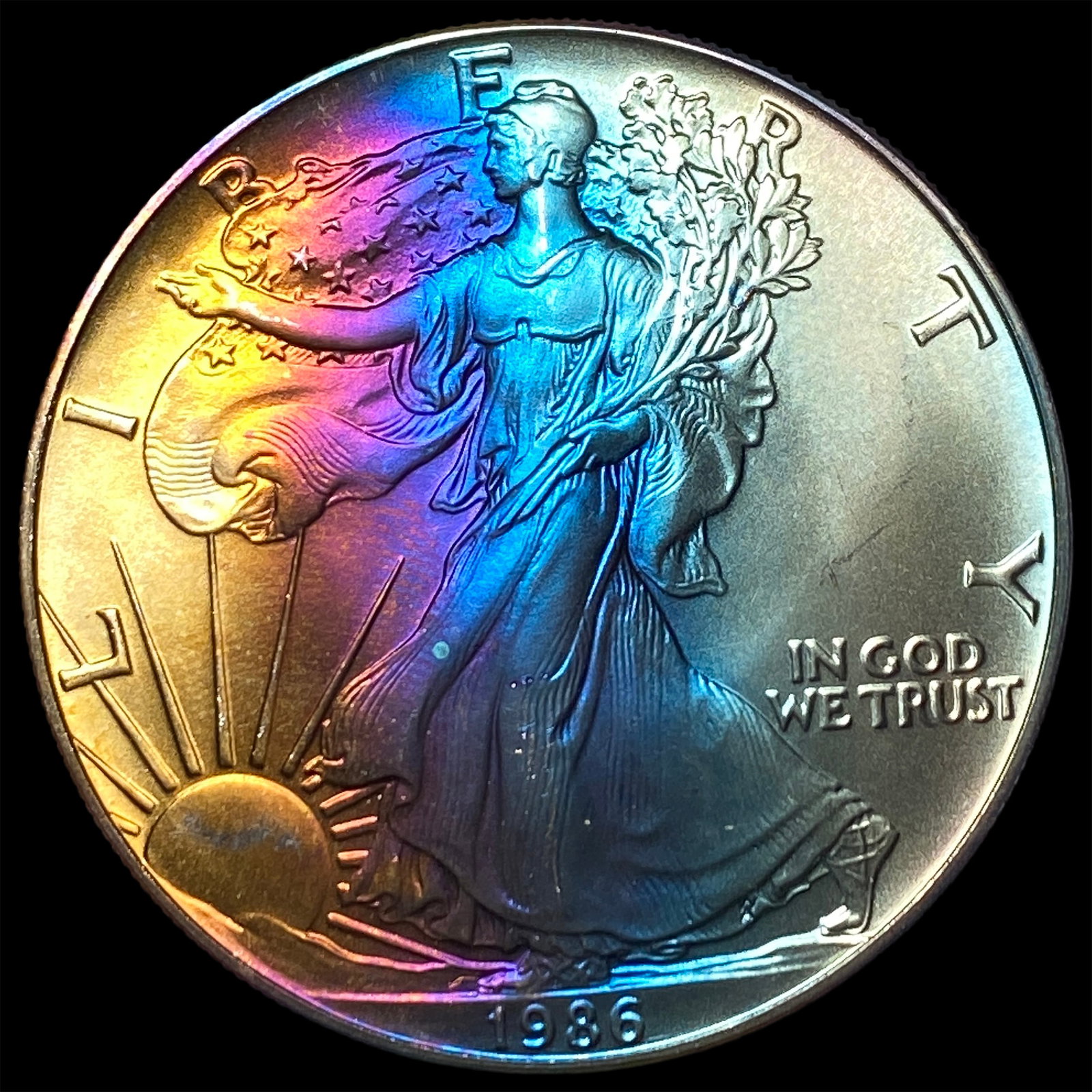 1986 Toned 1oz Silver American Eagle $1 GEM BU (1 of 2)