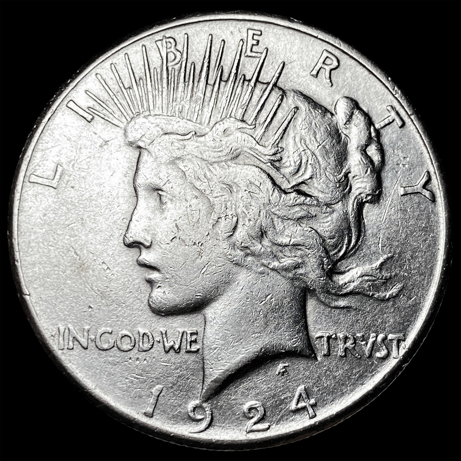 1924-S Silver Peace dollar CLOSELY UNCIRCULATED (1 of 2)