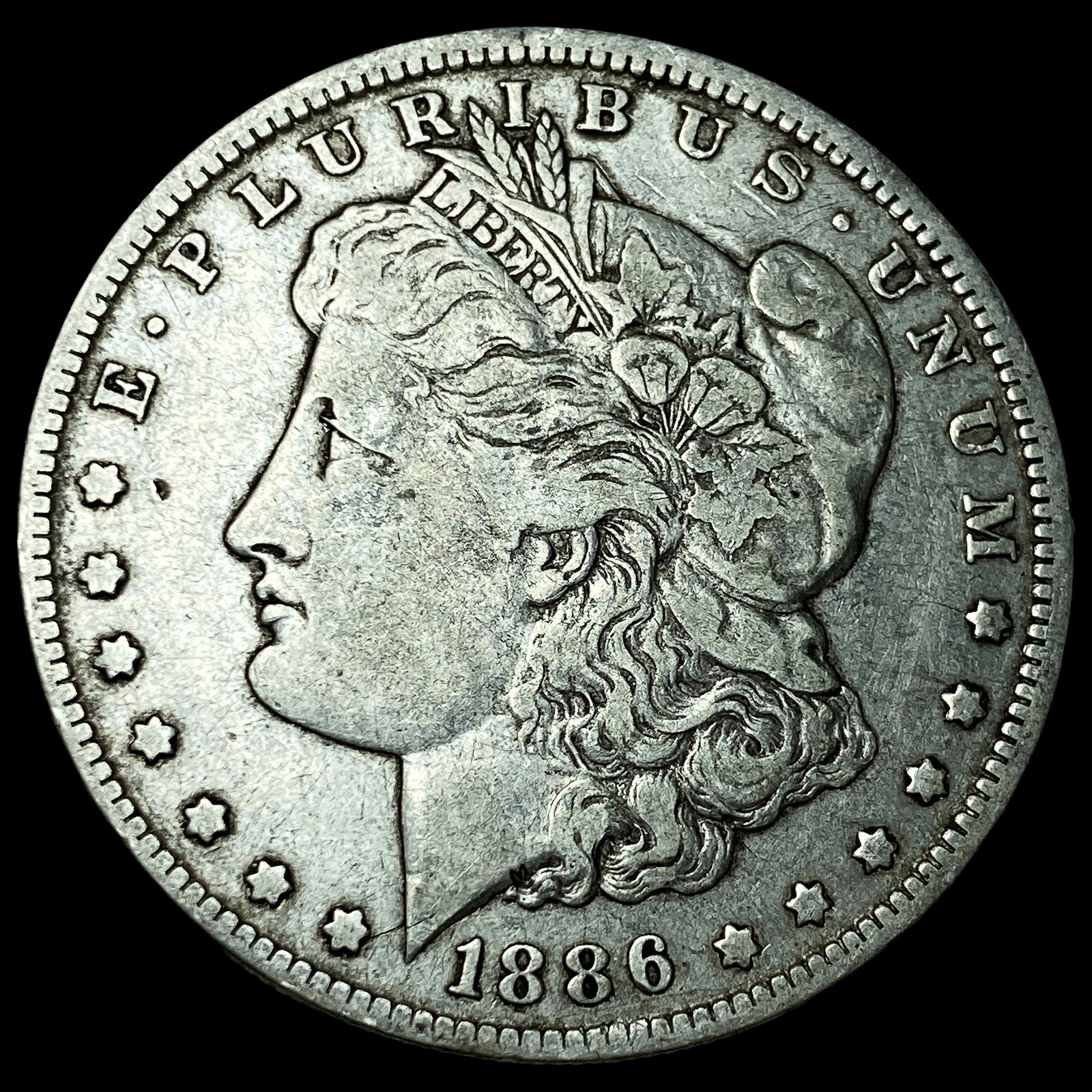 1886-O Silver Morgan Dollar NEARLY UNCIRCULATED (1 of 2)